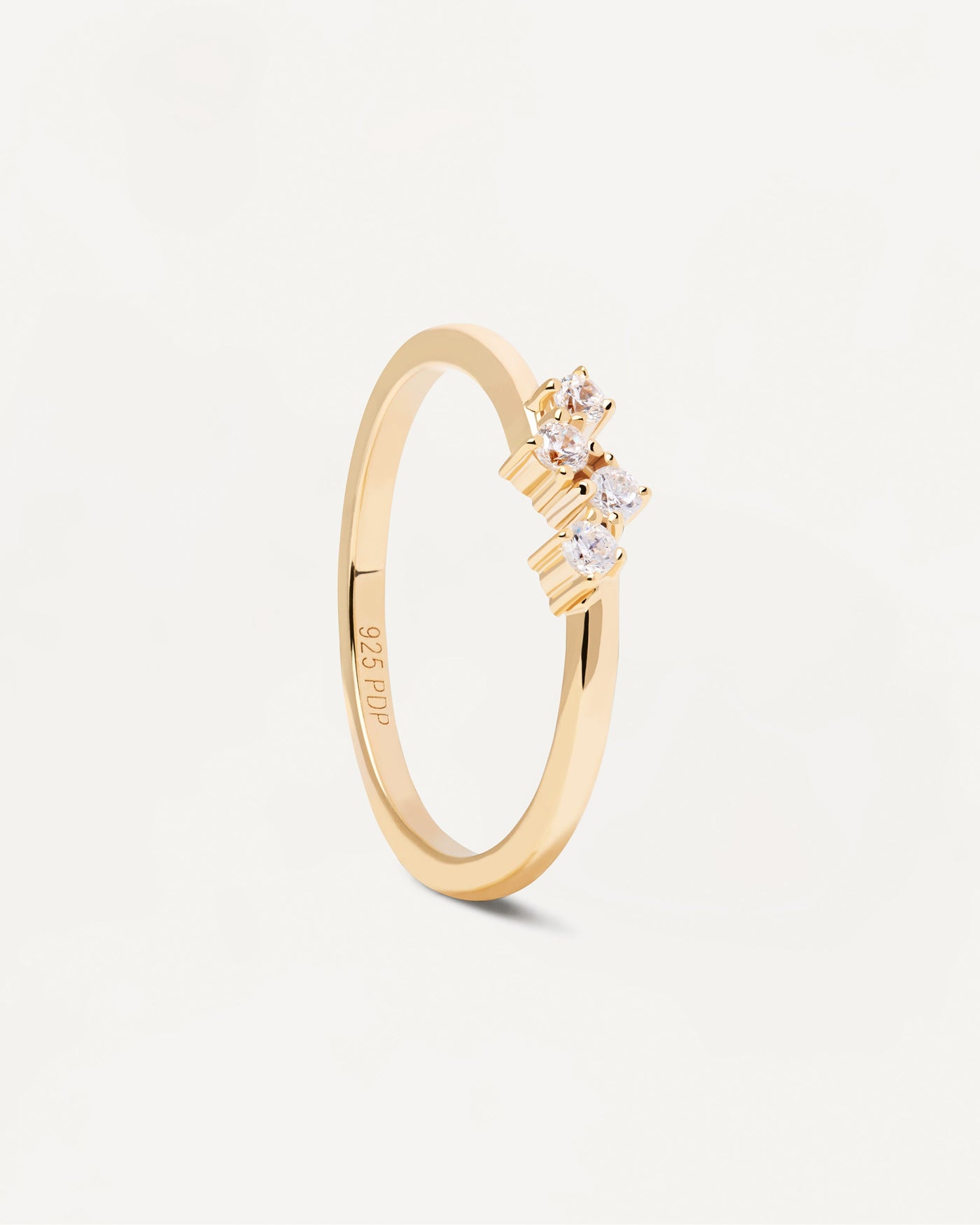 2023 Selection | Quatre Ring. Basic ring in gold-plated silver with 4 dainty zirconia. Get the latest arrival from PDPAOLA. Place your order safely and get this Best Seller. Free Shipping.