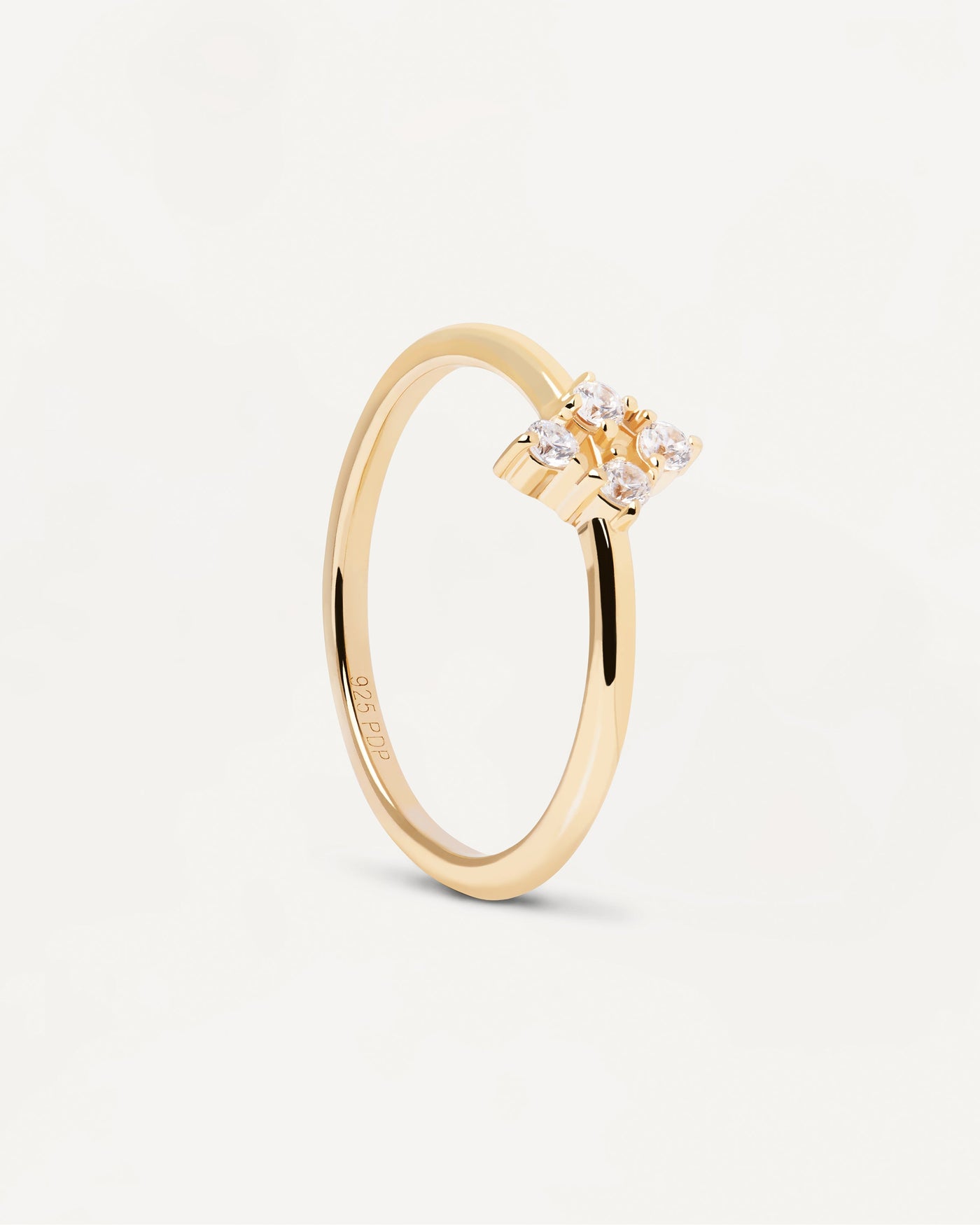 2024 Selection | Arda Ring. Basic ring in gold-plated silver with dainty white crystals. Get the latest arrival from PDPAOLA. Place your order safely and get this Best Seller. Free Shipping.