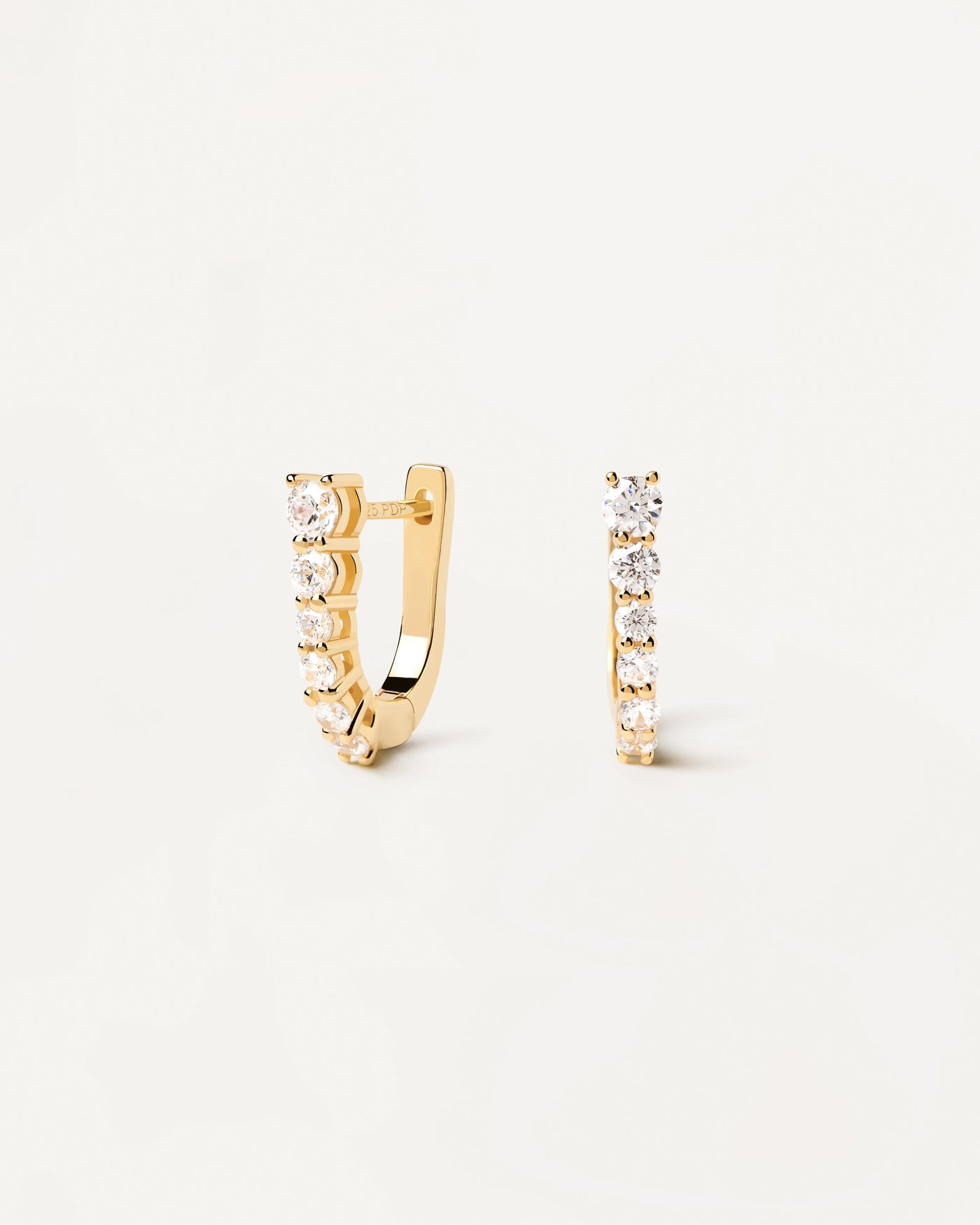 2023 Selection | Rise Earrings. Dainty hoops in gold-plated silver with white zirconia. Get the latest arrival from PDPAOLA. Place your order safely and get this Best Seller. Free Shipping.