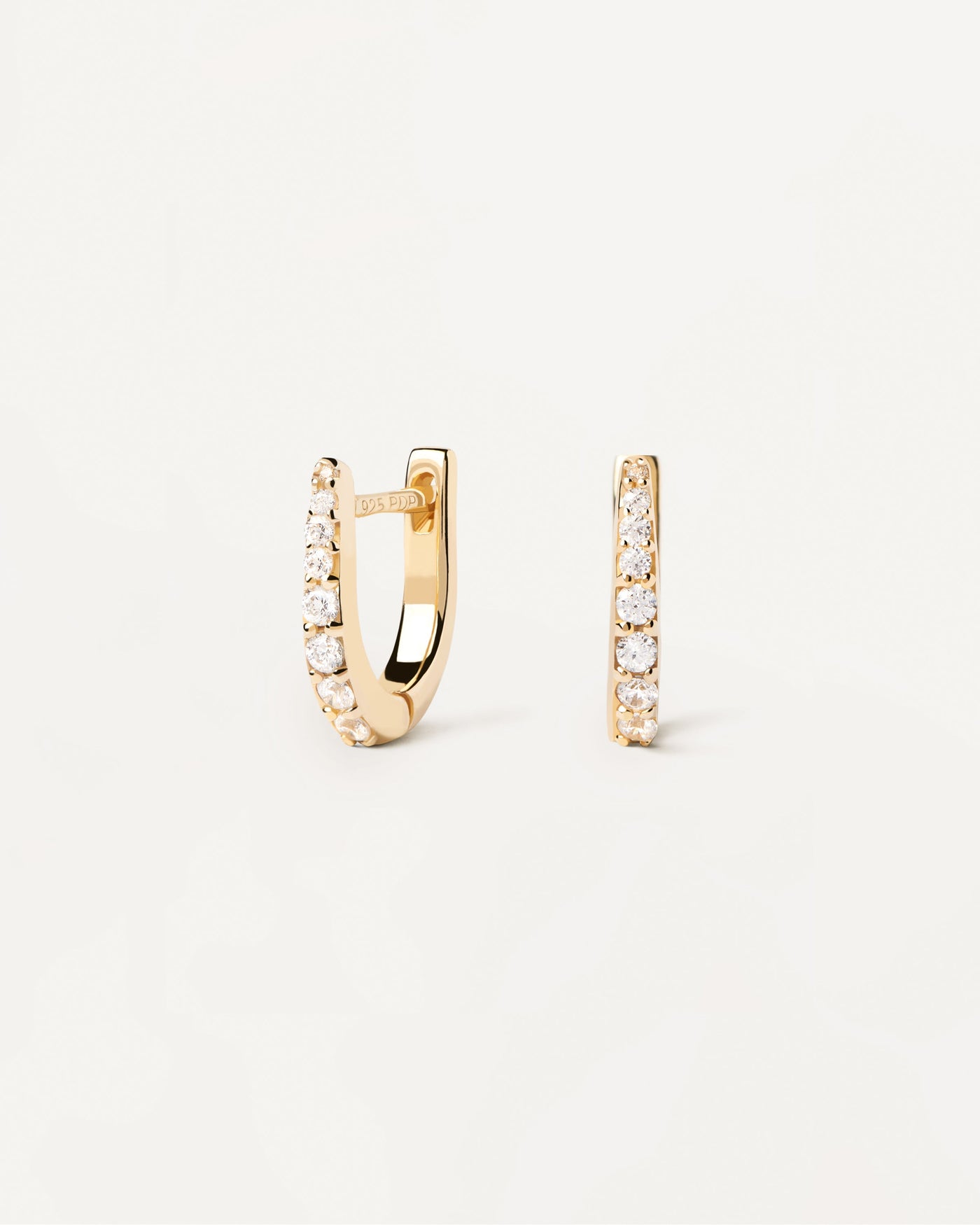 2023 Selection | Stare Earrings. Pointy hoops in gold-plated silver with white zirconia. Get the latest arrival from PDPAOLA. Place your order safely and get this Best Seller. Free Shipping.