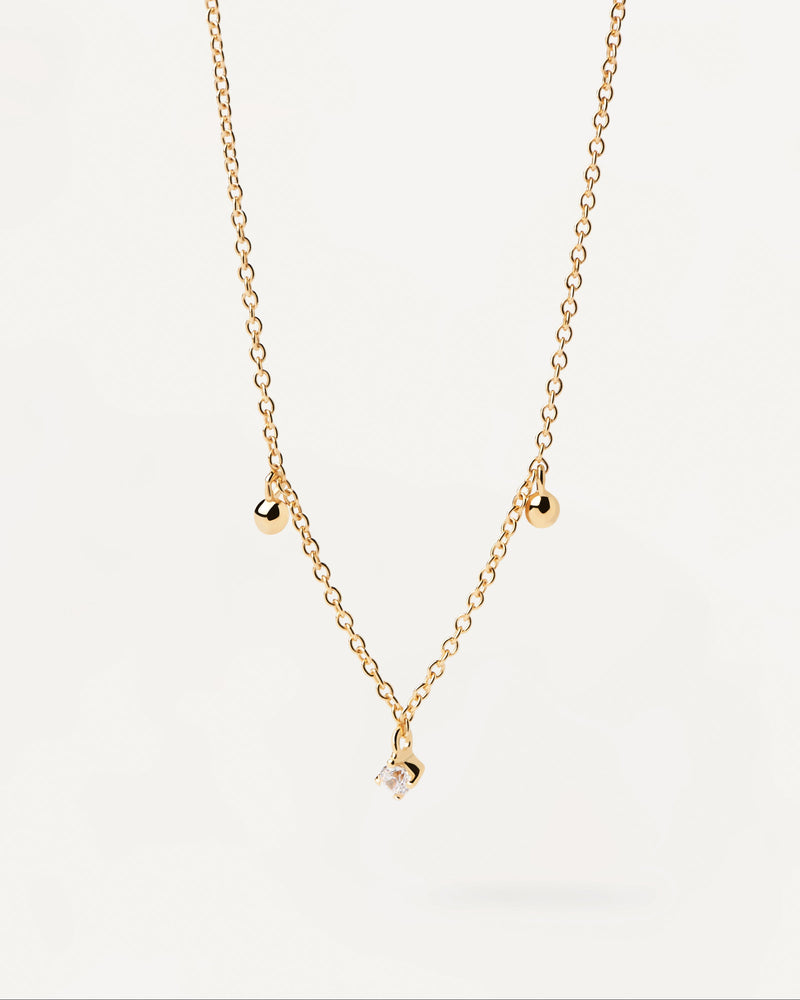 Gold-plated chain necklace with dainty balls and white zirconia