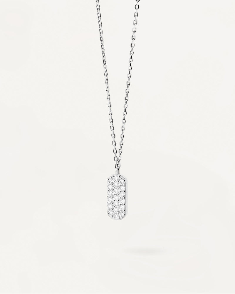 Sterling silver necklace with oval pendant and white zirconia