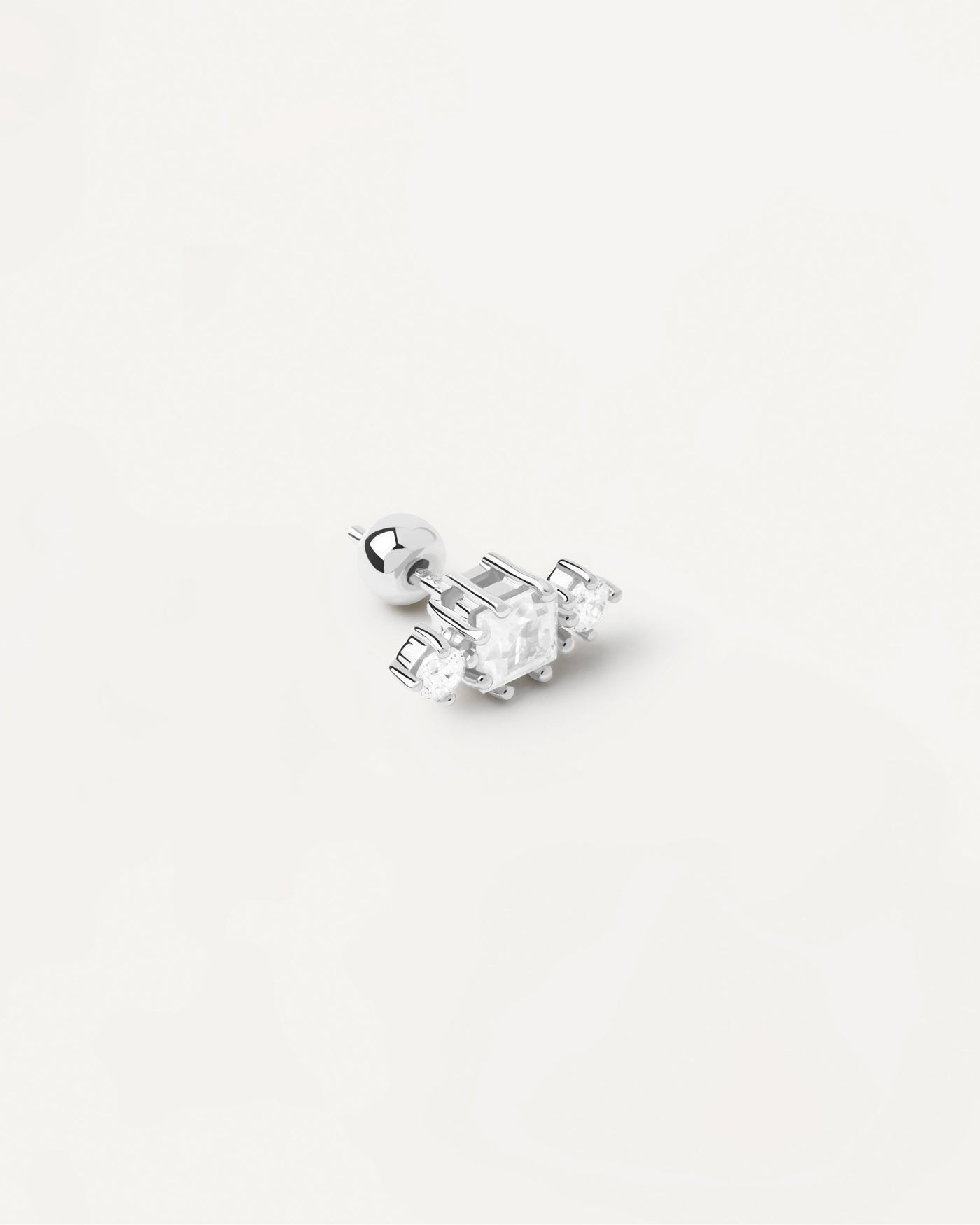 2023 Selection | Lyn Single Silver Earring. Silver ear piercing with big square zirconia and small crystals. Get the latest arrival from PDPAOLA. Place your order safely and get this Best Seller. Free Shipping.