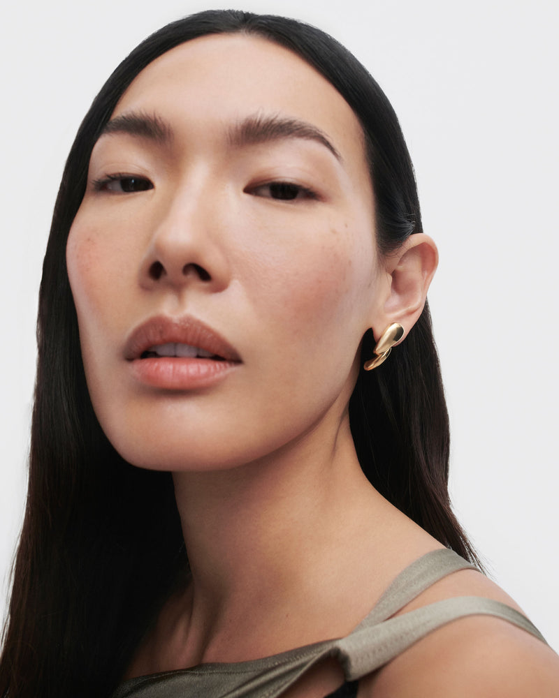 Pendientes Orbit - 
  
    Plata de Ley / Baño de Oro 18K
  
