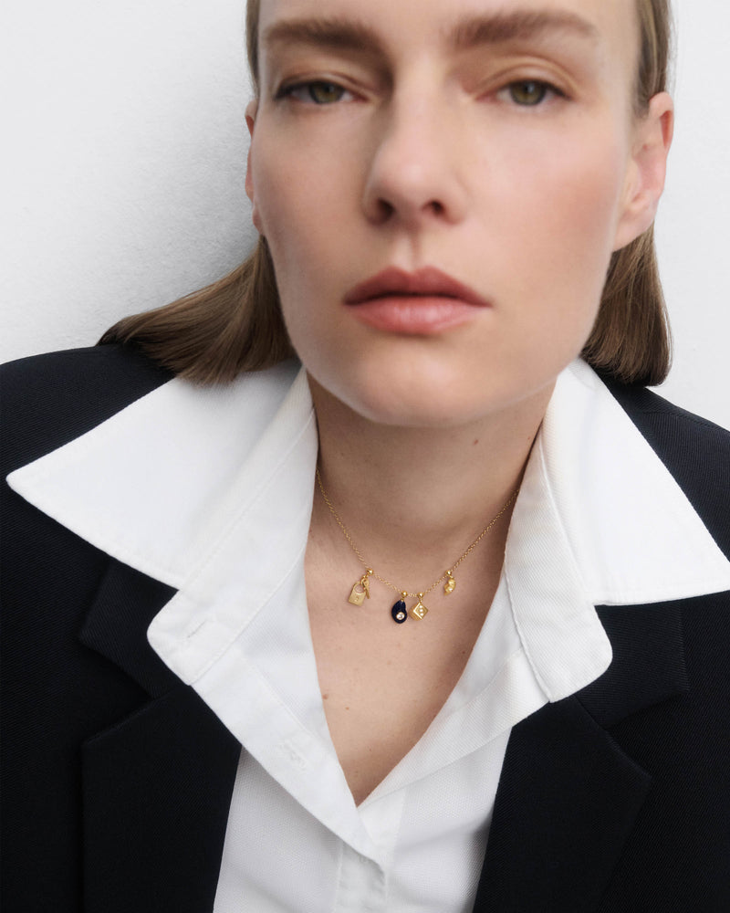 Charm Lucchetto e chiave - 
  
    Argento sterling / Placcatura in Oro 18K
  
