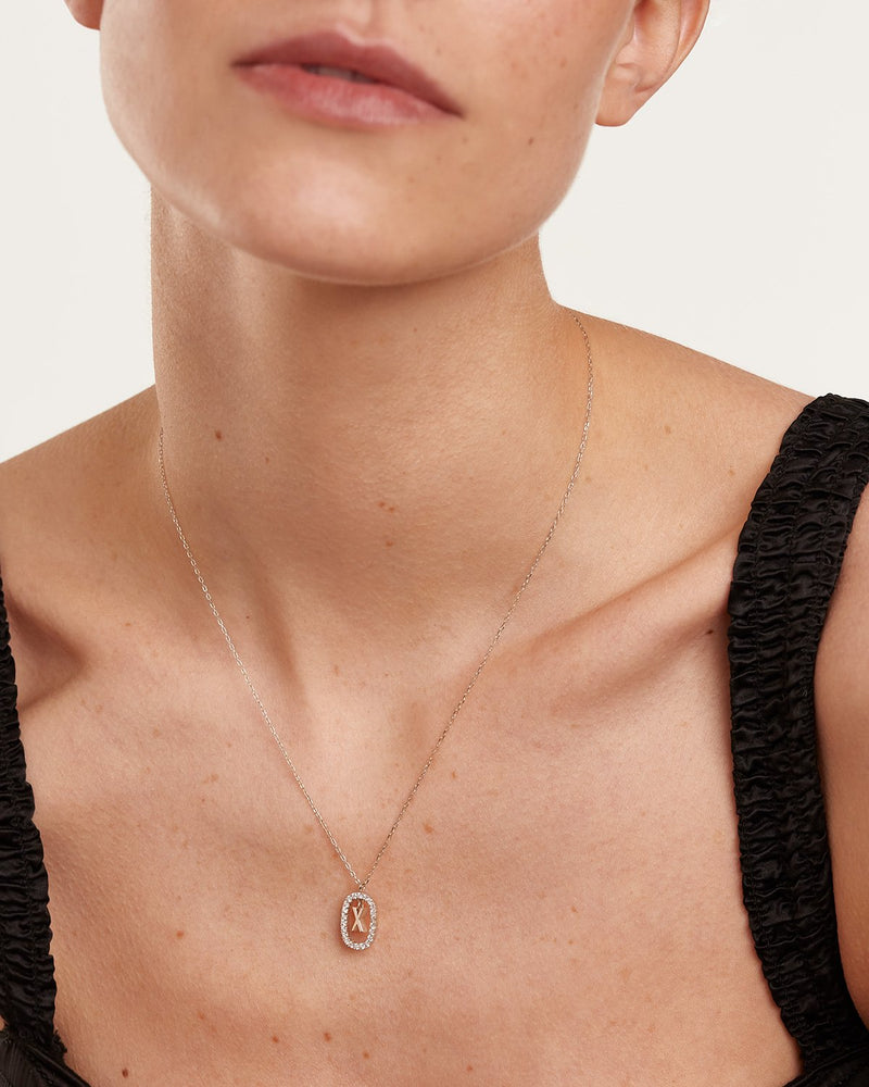 Collana in Diamanti E Oro Bianco Con Lettera X - 
  
    Oro bianco 18K / Placcatura in argento rodiato
  
