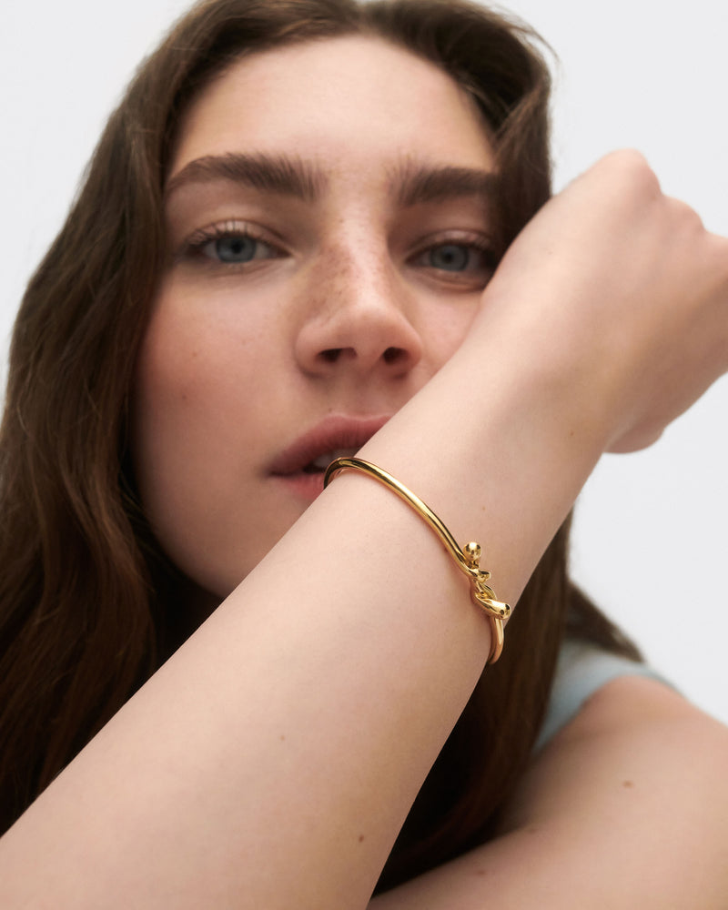Bracciale rigido Twist - 
  
    Argento sterling / Placcatura in Oro 18K
  
