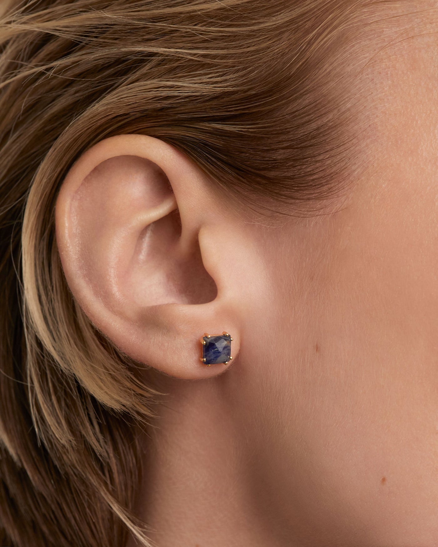 Crystal and zirconia Sodalite ear piercings