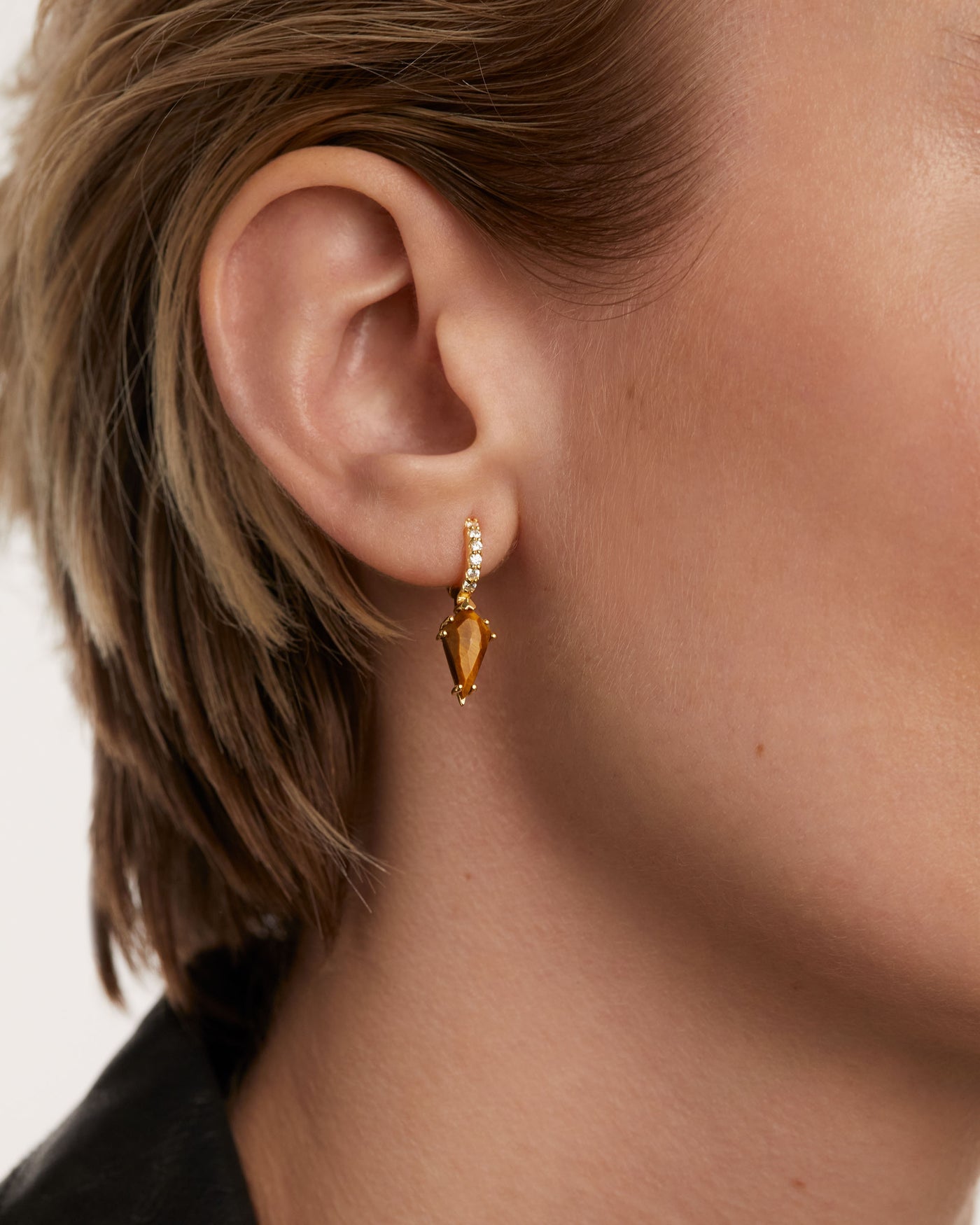 Crystal and zirconia Tiger eye ear piercings