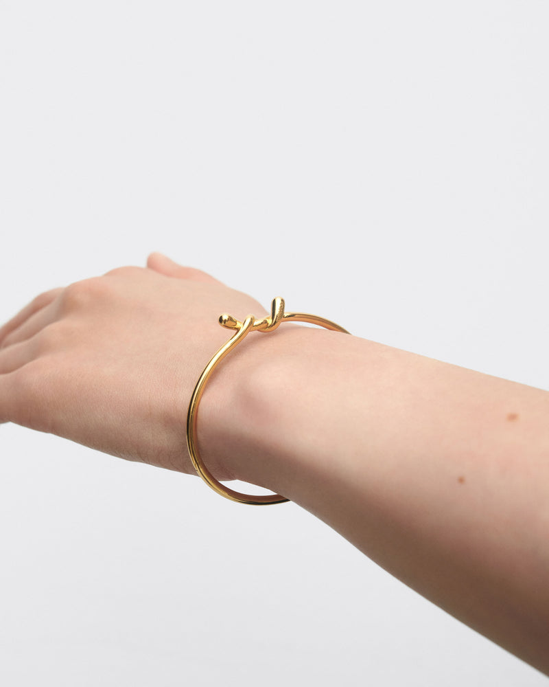 Bracciale rigido Twist - 
  
    Argento sterling / Placcatura in Oro 18K
  
