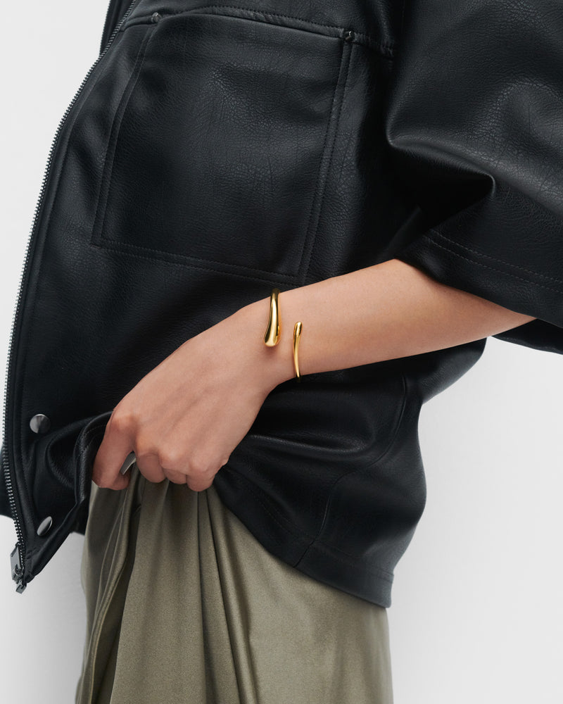 Bracciale rigido Orbit - 
  
    Argento sterling / Placcatura in Oro 18K
  
