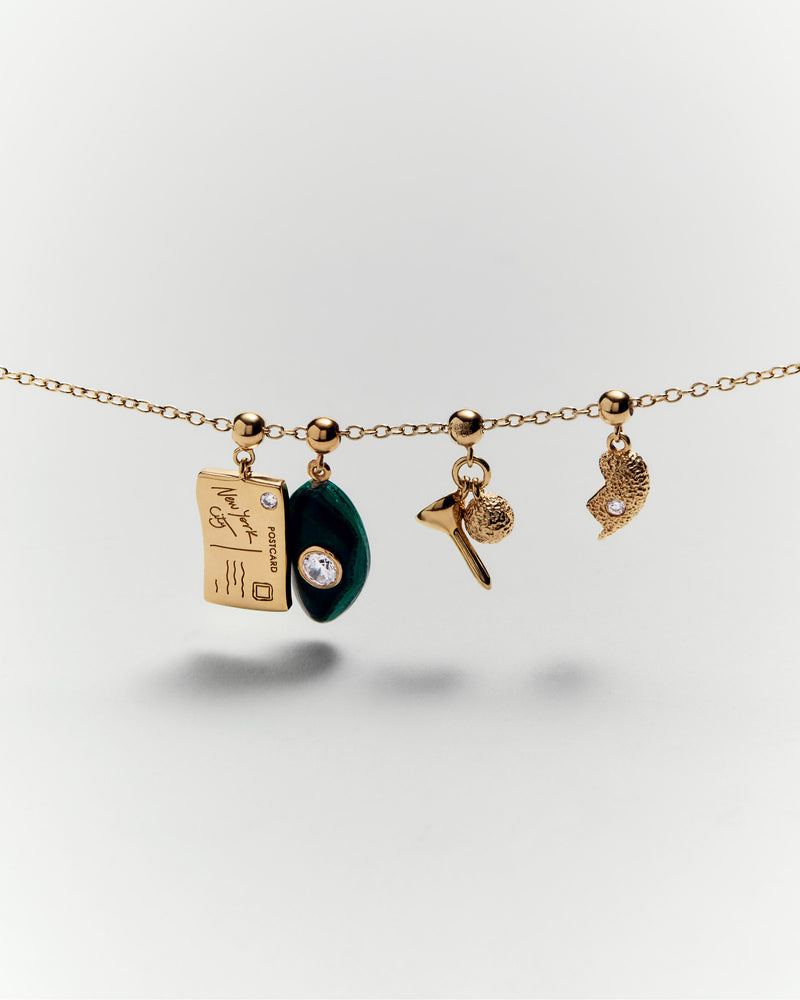 Charm Cartolina New York - 
  
    Argento sterling / Placcatura in Oro 18K
  
