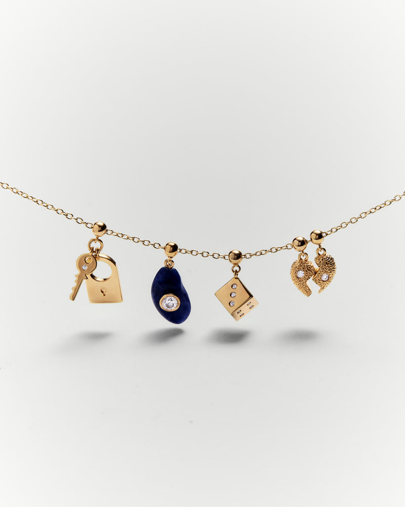 Charm Lucchetto e chiave - 
  
    Argento sterling / Placcatura in Oro 18K
  

