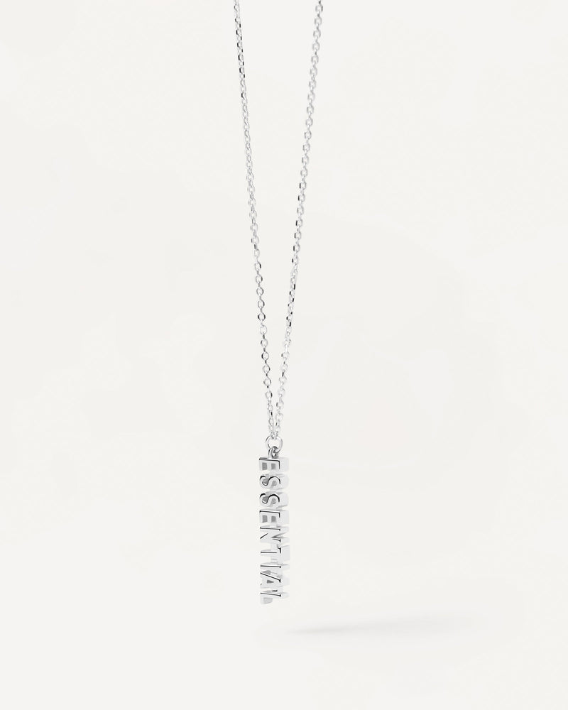 Sterling silver necklace with a word pendant: Essential