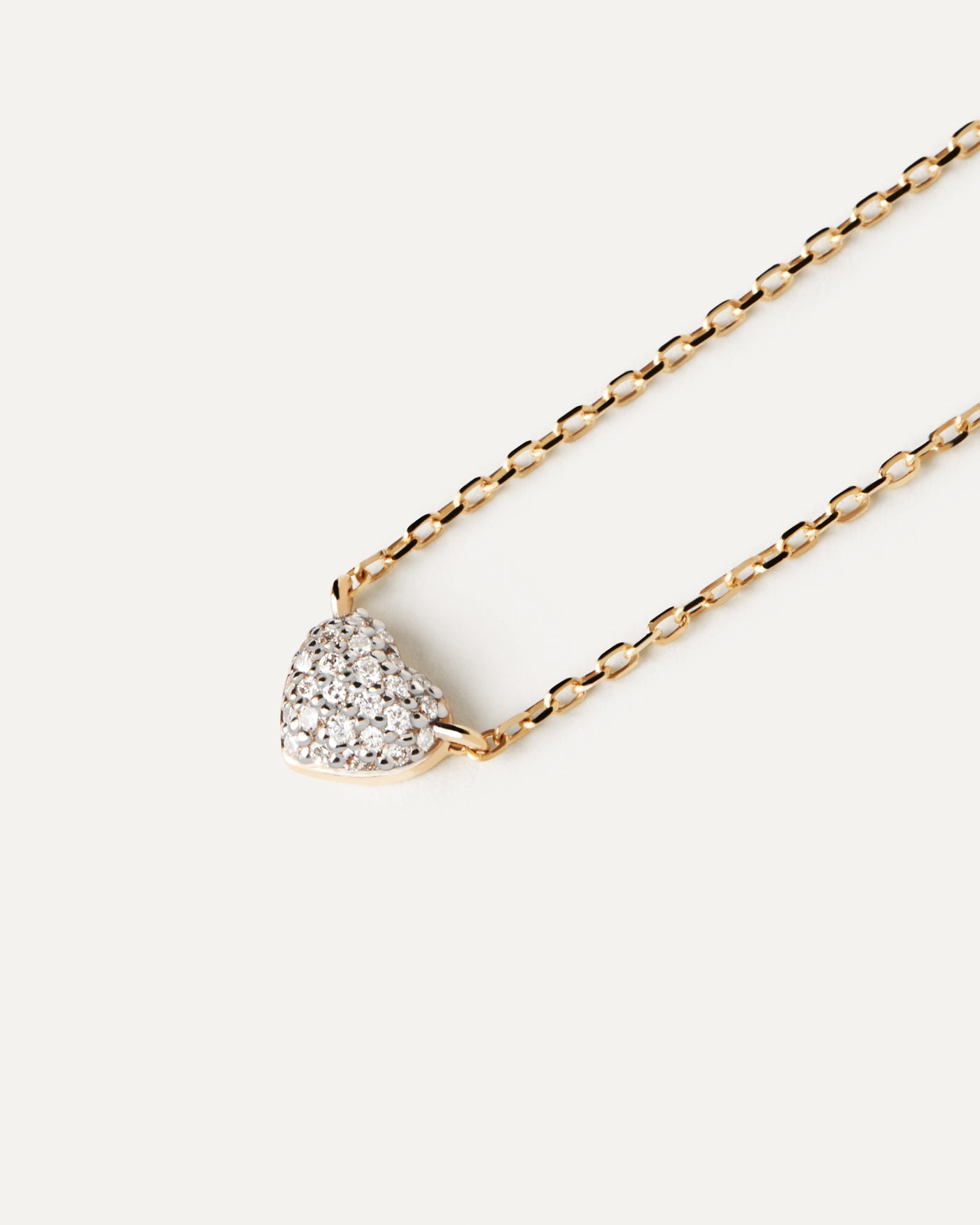 Diamonds and gold Heart solitary necklace. Solid yellow gold necklace with a heart shape pavé lab-grown diamond of 0.11 carats. Get the latest arrival from PDPAOLA. Place your order safely and get this Best Seller.