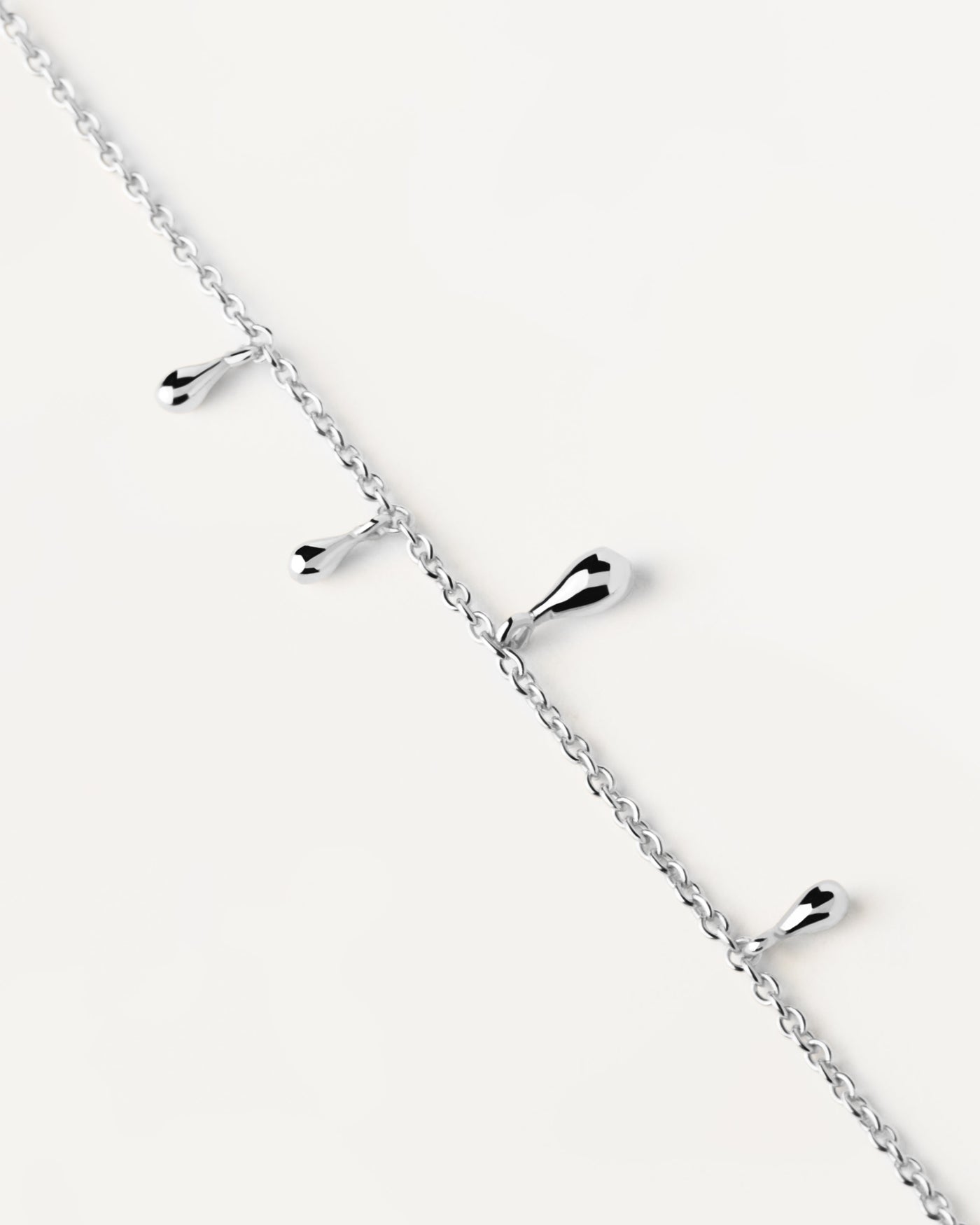 2023 Selection | Teardrop Silver Bracelet. Sterling silver bracelet with small drop pendants. Get the latest arrival from PDPAOLA. Place your order safely and get this Best Seller. Free Shipping.
