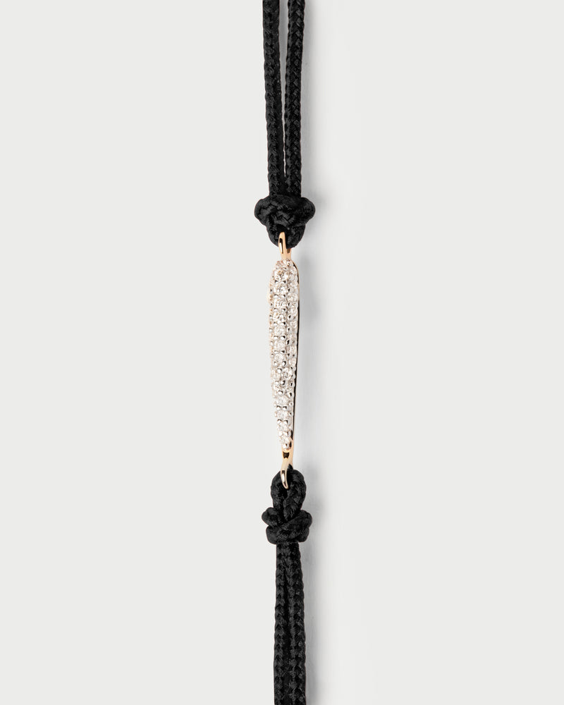 Adjustable diamond cord bracelet featuring an oval pavé lab-grown diamond motif