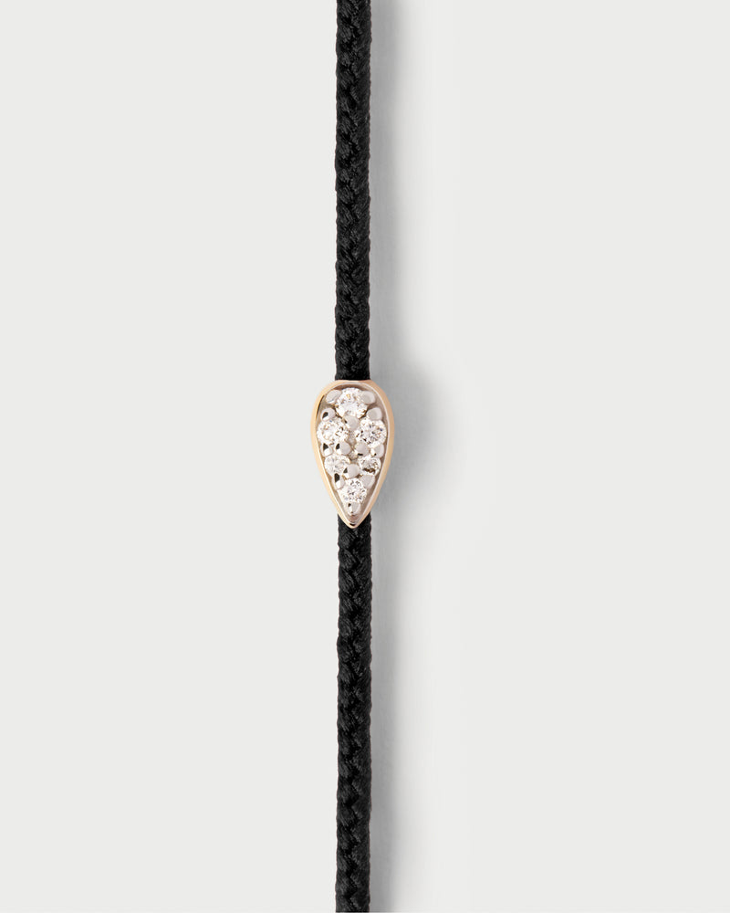 Adjustable diamond cord bracelet featuring a drop set with pavé lab-grown diamonds