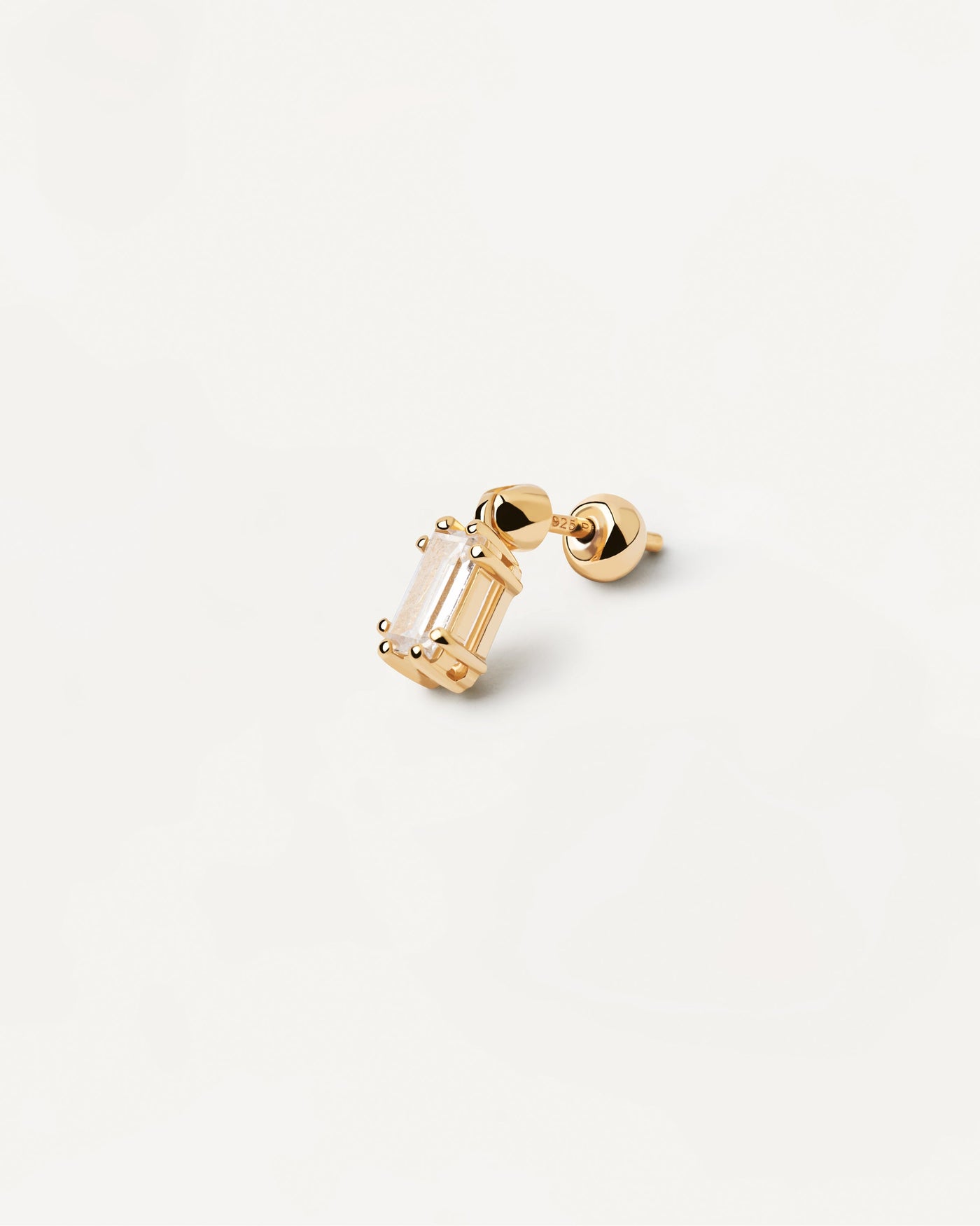 2023 Selection | Ali Single Earring. Gold-plated ear piercing with baguette cut white zirconia. Get the latest arrival from PDPAOLA. Place your order safely and get this Best Seller. Free Shipping.