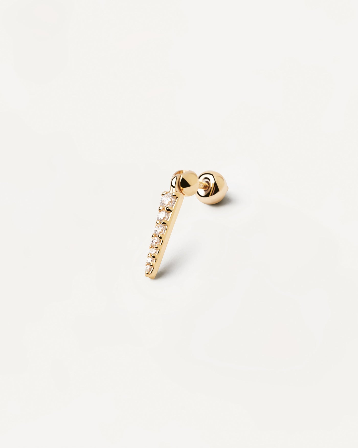 Pendiente Individual Vero. Piercing oreja en forma de punta bañado en oro con circonitas blancas. Consigue las últimas novedades de PDPAOLA. Haz tu pedido de forma segura y obtén este Best Seller.