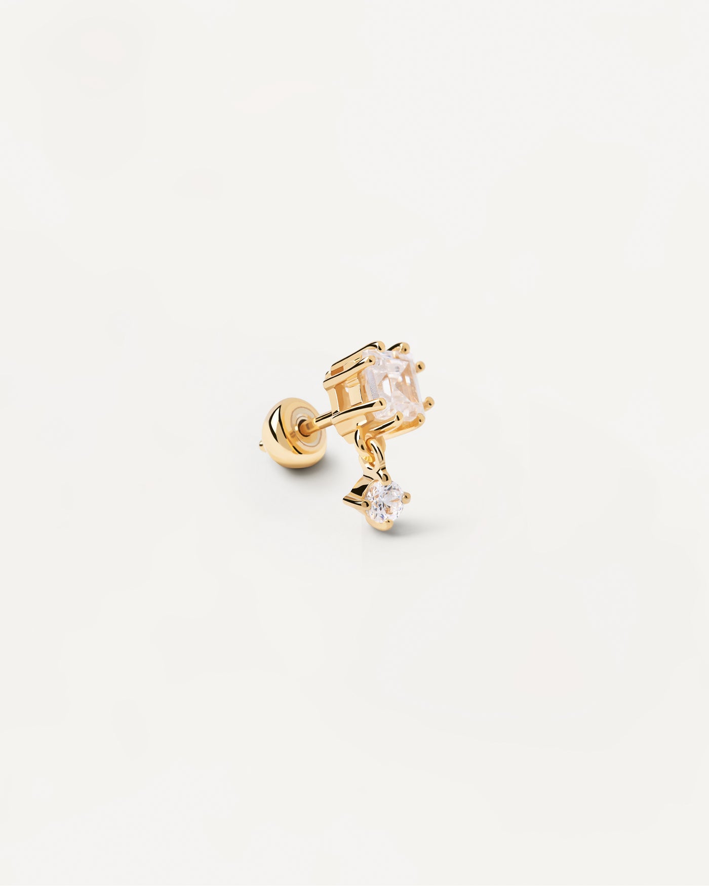 Sélection 2023 | Boucle d'oreille individuelle Eli. Piercing d'oreille en plaqué or avec zircon blanc carré coupe Asscher. Découvrez les dernières nouveautés de chez PDPAOLA. Commandez et recevez votre bijou en toute sérénité. Livraison gratuite.
