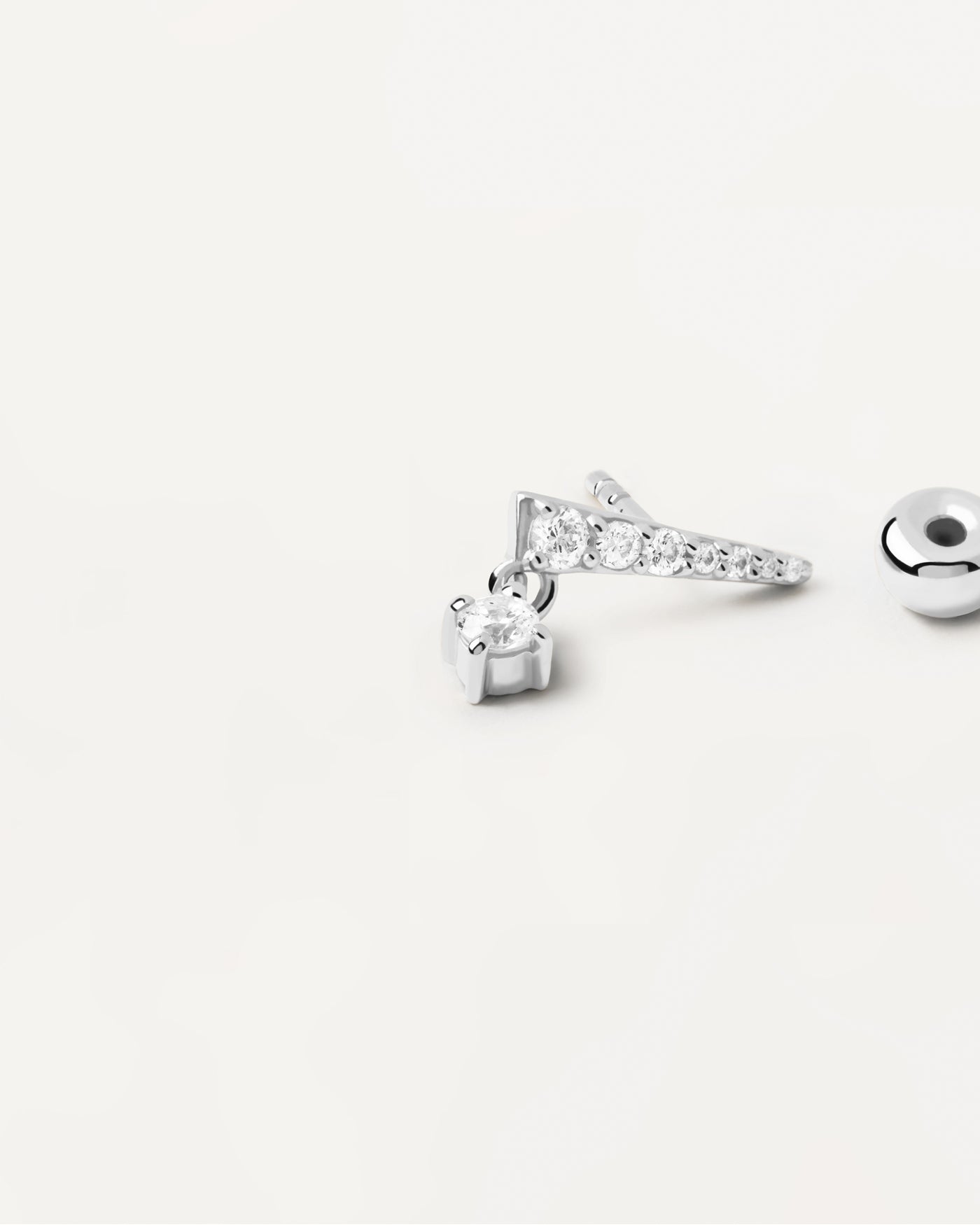 2023 Selection | Ava Single Silver Earring. Sterling silver ear piercing in point shape with white zirconia. Get the latest arrival from PDPAOLA. Place your order safely and get this Best Seller. Free Shipping.