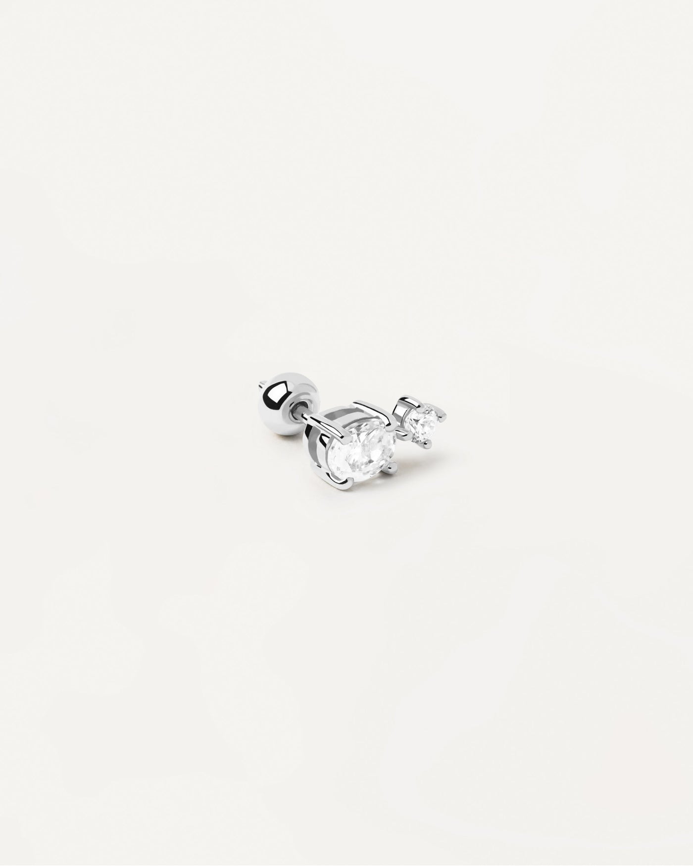 2023 Selection | Nikita Single Silver Earring. 2 white zirconia ear piercing in sterling silver. Get the latest arrival from PDPAOLA. Place your order safely and get this Best Seller. Free Shipping.