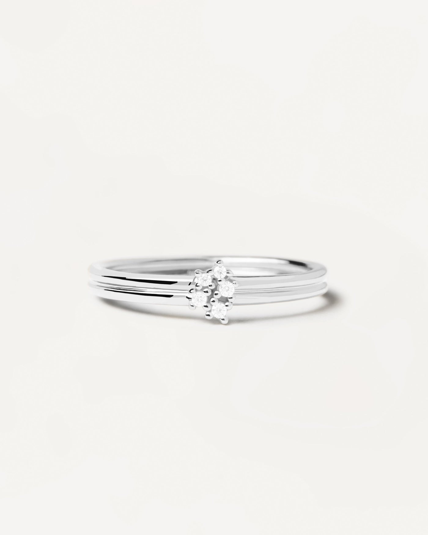 2023 Selection | Nova Silver Ring. Sterling silver ring with two bands set with five dainty zirconias. Get the latest arrival from PDPAOLA. Place your order safely and get this Best Seller. Free Shipping.