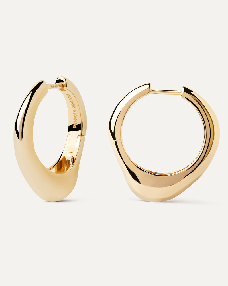 Gold-plated organic shape big hoops with a fluid design