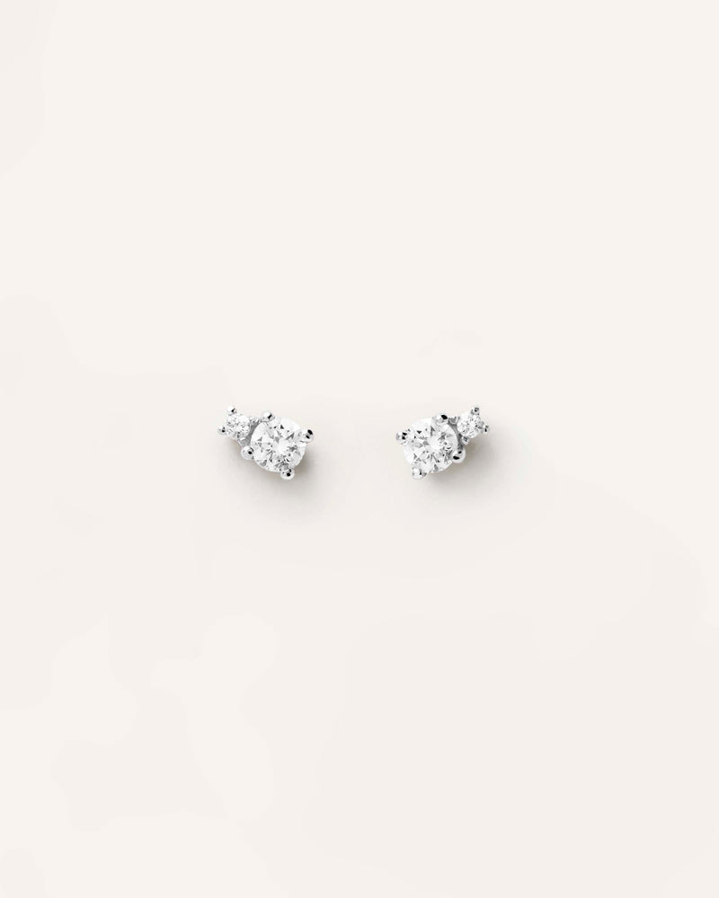 Diamonds and White Gold Solitaire Duo Studs - 
  
    18K White gold / Rhodium silver plating
  
