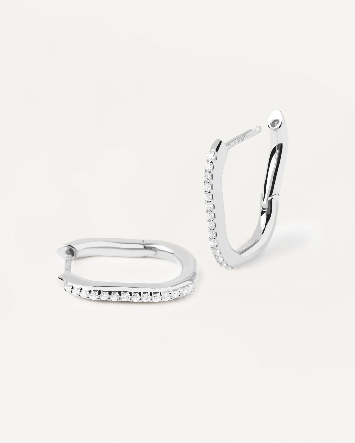 2023 Selection | Spike Silver Earrings. Oval sterling silver hoops with white zirconia. Get the latest arrival from PDPAOLA. Place your order safely and get this Best Seller. Free Shipping.