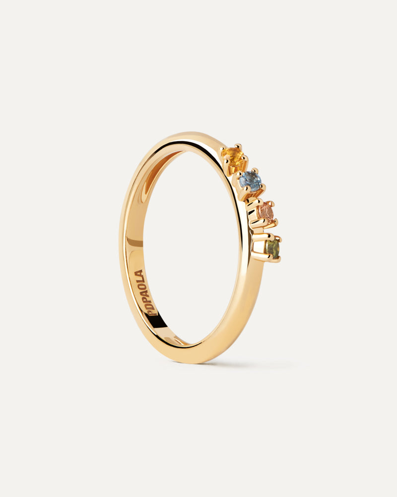 Anillo de plata bañada en oro con un set ondulado de circonitas cúbicas multicolores