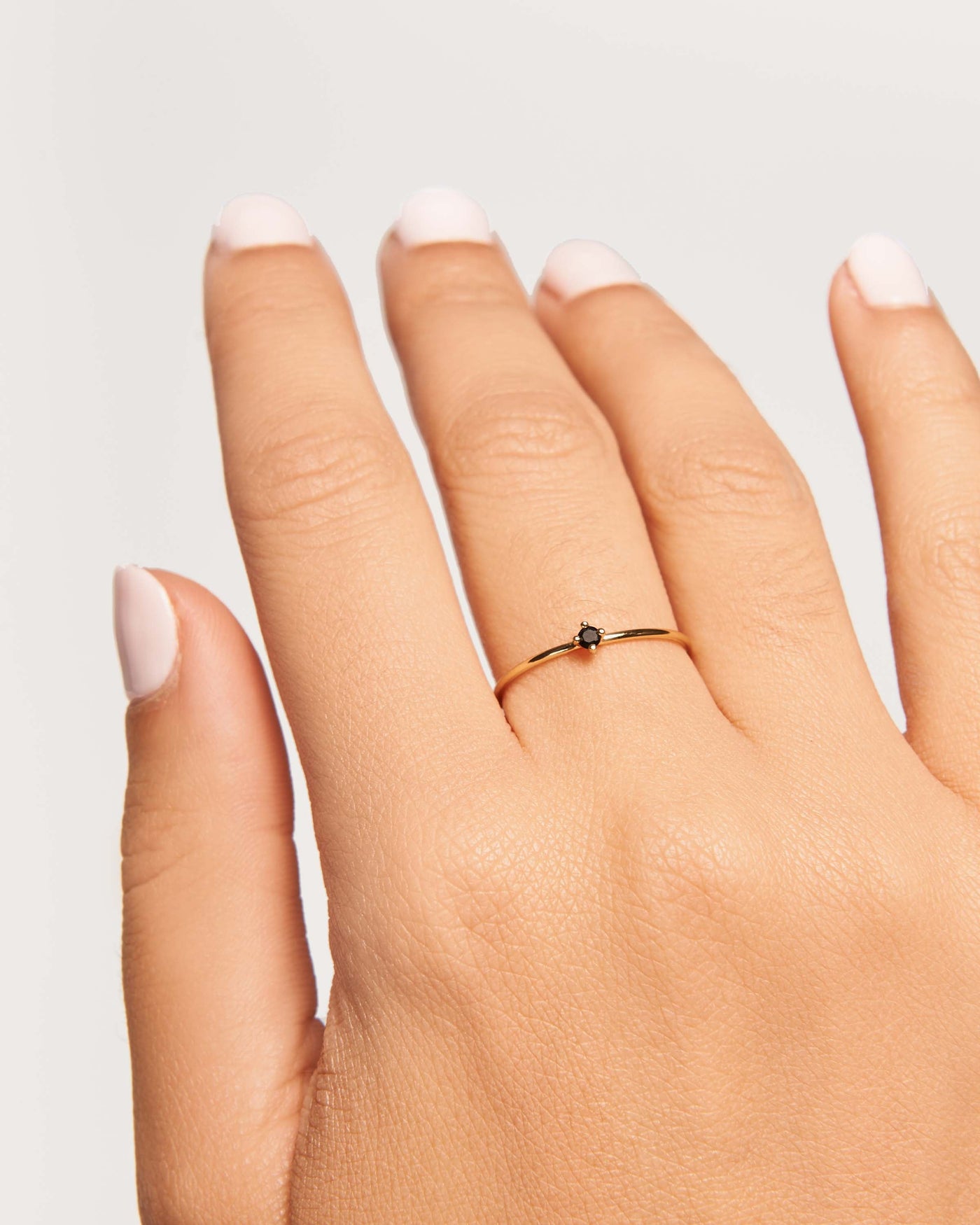 Black Solitary Ring 
  
    Sterling Silver / 18K Gold plating
  
