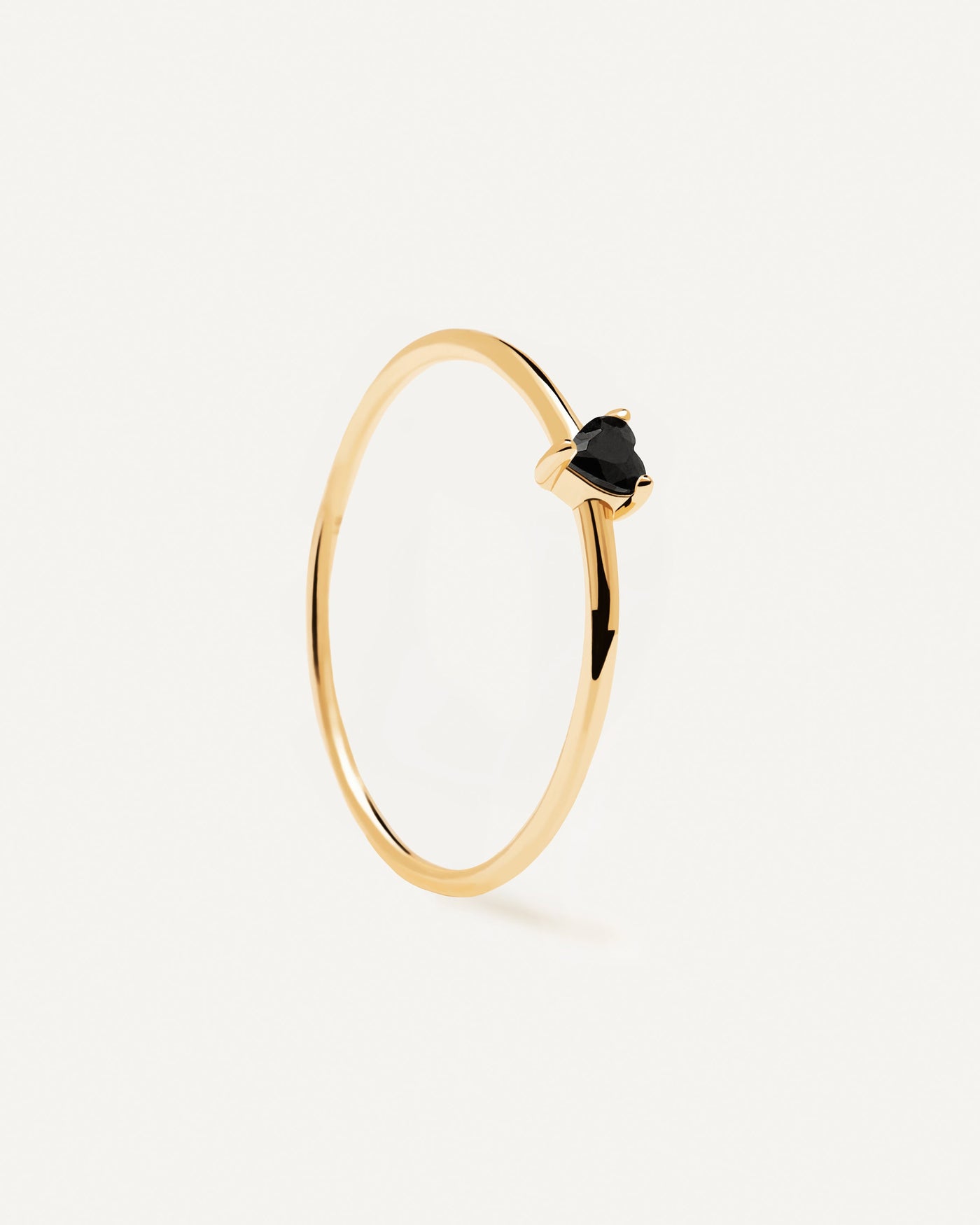 2023 Selection | Black Heart Ring. Heart-shaped black zirconia stone prong-set on a thin 18k gold plated ring. Get the latest arrival from PDPAOLA. Place your order safely and get this Best Seller. Free Shipping.