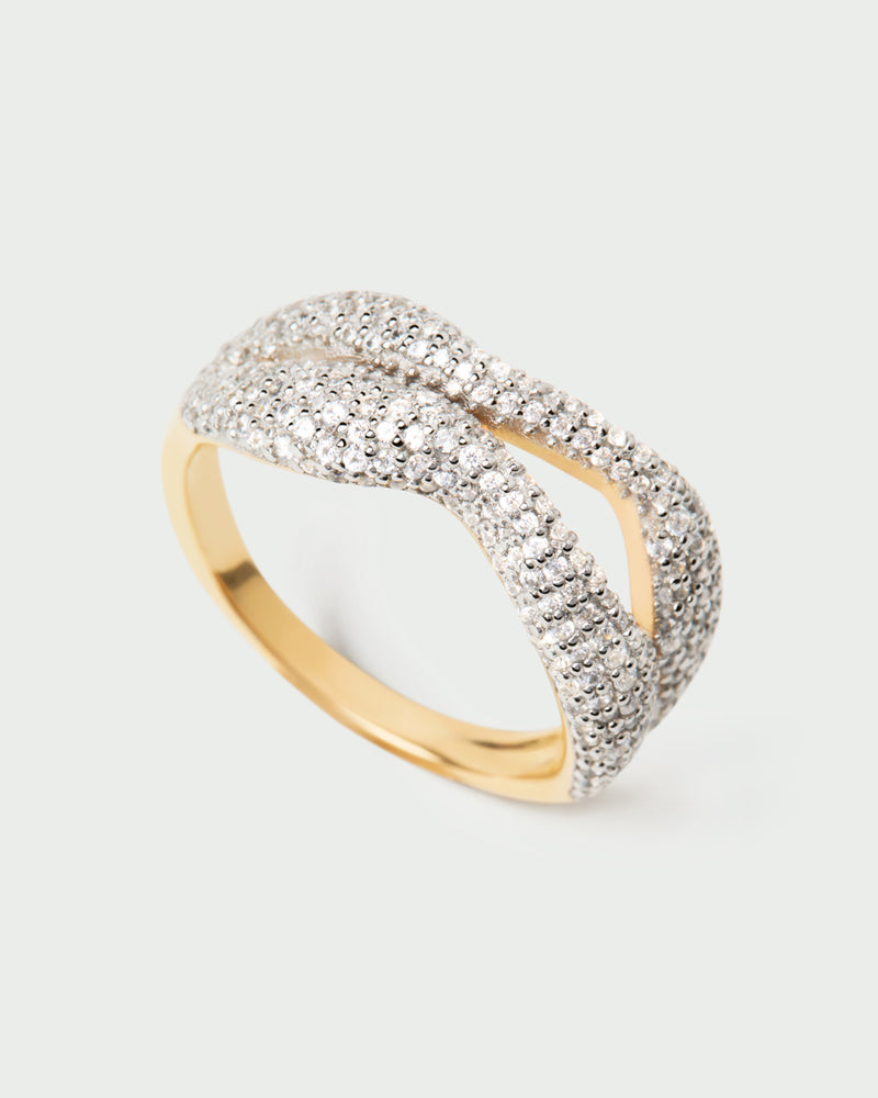 Anillo elegante de dos bandas engastado con pavé de circonitas y líneas fluidas