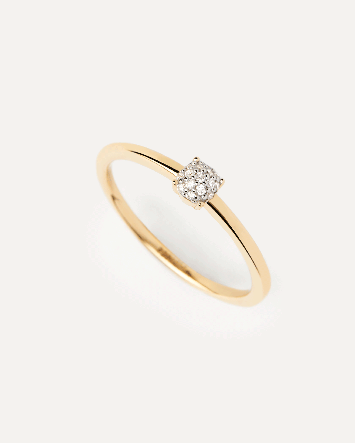 Diamonds and gold Dona solitary ring. Slim round solitary ring in solid 18K yellow gold set with pavé lab-grown diamonds. Get the latest arrival from PDPAOLA. Place your order safely and get this Best Seller.