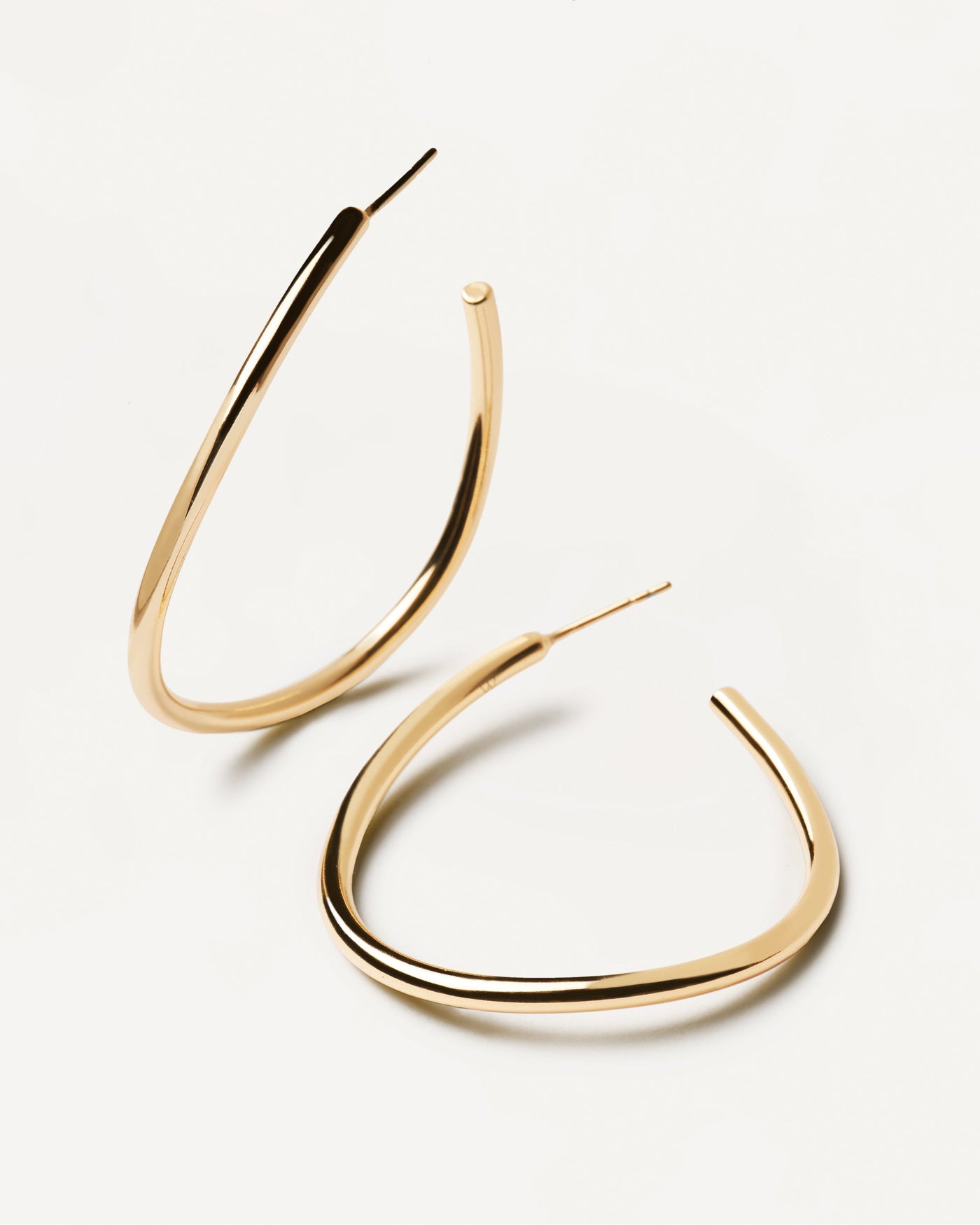 2023 Selection | Yoko Earrings. Open loop large wavy hoop earrings in 18k gold plated silver. Get the latest arrival from PDPAOLA. Place your order safely and get this Best Seller. Free Shipping.
