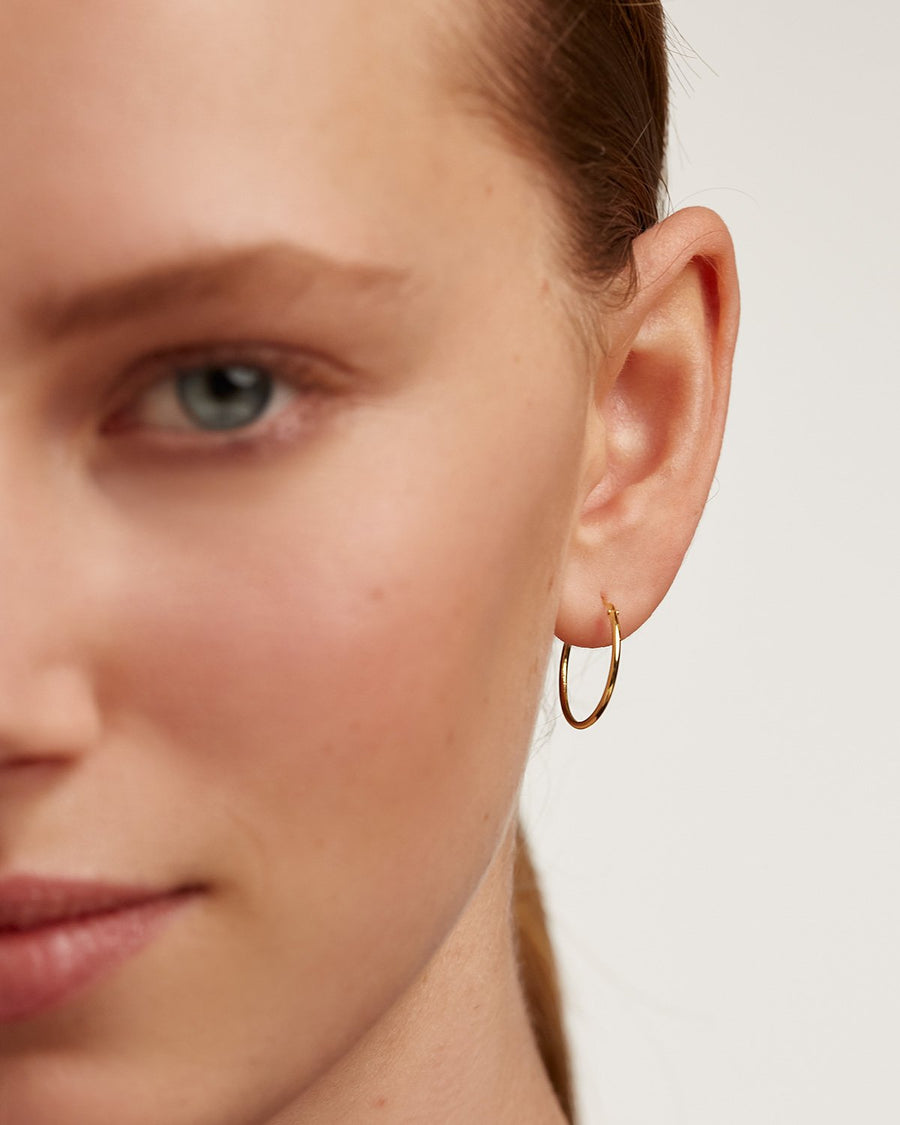 Gold plated medium hoop earrings discount