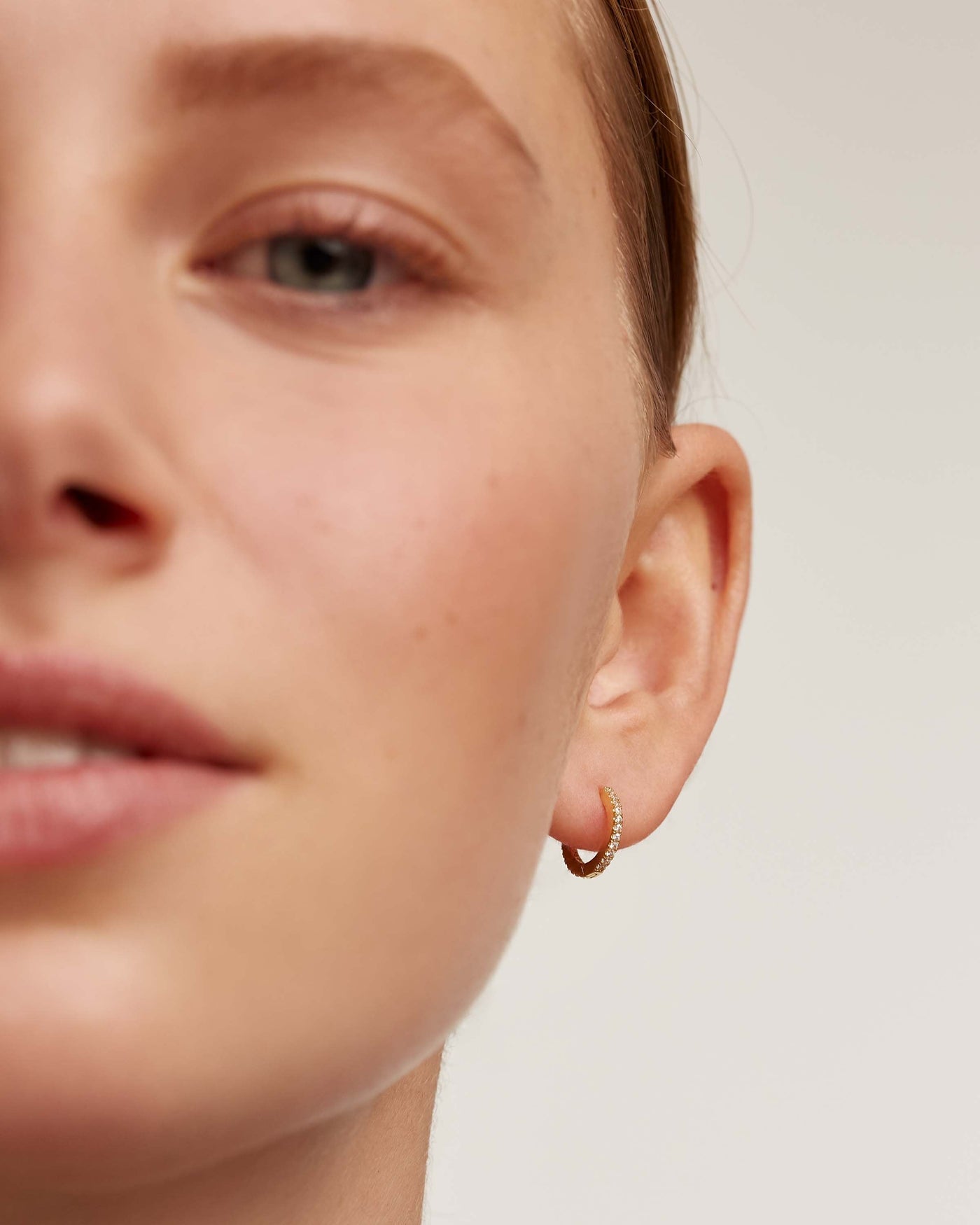 White Mini Hoops 
  
    Sterling Silver / 18K Gold plating
  
