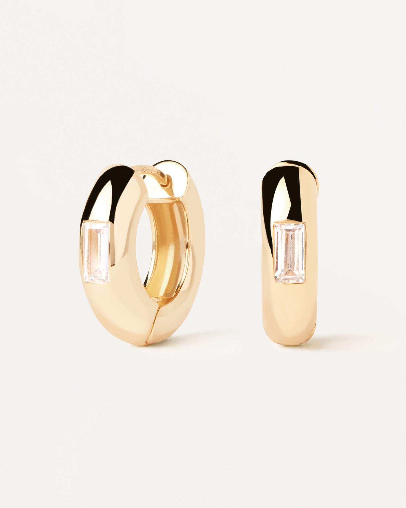 2023 Selection | Kali Hoop Earrings. Bold hoop earrings in gold-plated silver with rectangular white zirconia. Get the latest arrival from PDPAOLA. Place your order safely and get this Best Seller. Free Shipping.