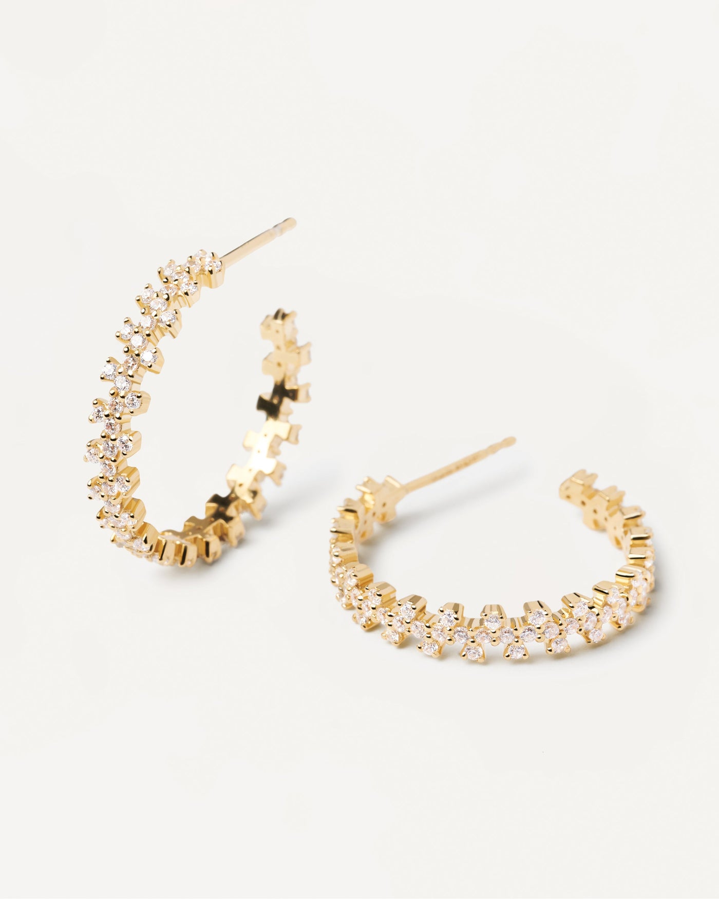 2023 Selection | Crown Earrings. Gold-plated hoop earrings with white zirconia. Get the latest arrival from PDPAOLA. Place your order safely and get this Best Seller. Free Shipping.