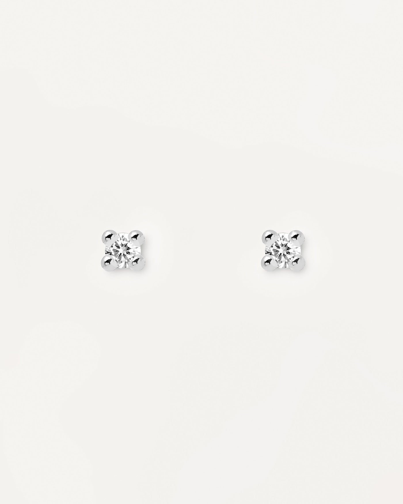 2023 Selection | Essentia Silver Earrings. Pair of 925 sterling silver stud earrings set with a white zirconia stone. Get the latest arrival from PDPAOLA. Place your order safely and get this Best Seller. Free Shipping.