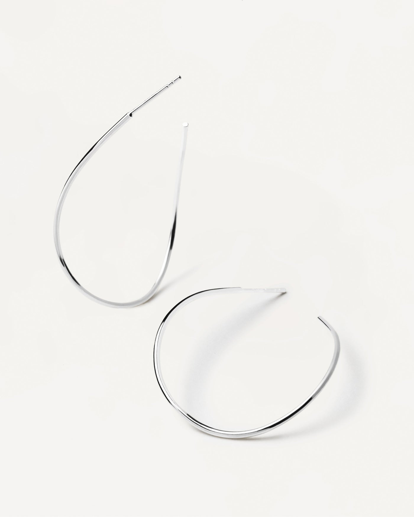2023 Selection | Niko Silver Earrings. Open loop wavy oval hoop earrings in 925 sterling silver. Get the latest arrival from PDPAOLA. Place your order safely and get this Best Seller. Free Shipping.
