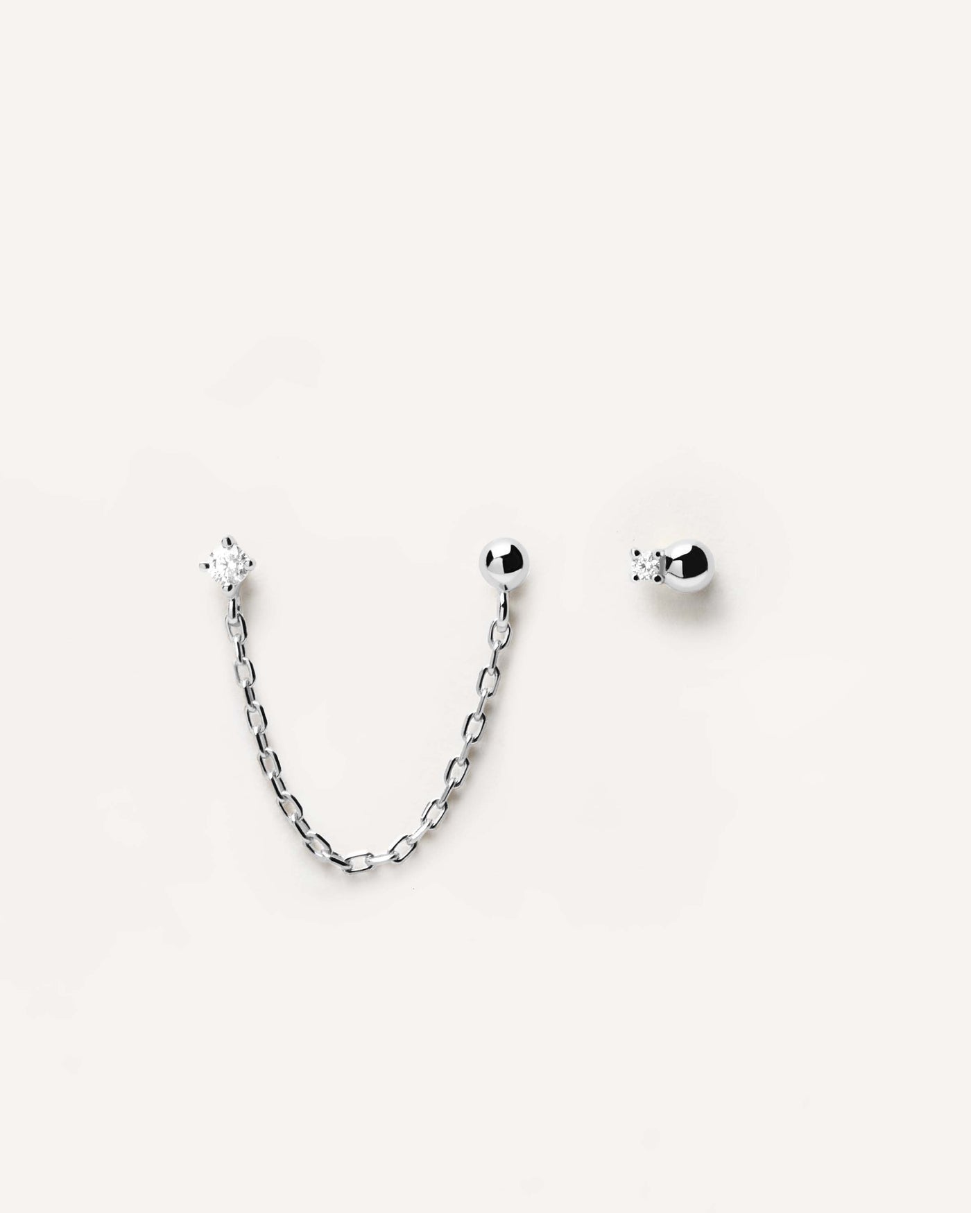 2023 Selection | Musketeer Silver Earrings. Chain linked and single 925 sterling silver studs set with two white zirconia stones. Get the latest arrival from PDPAOLA. Place your order safely and get this Best Seller. Free Shipping.