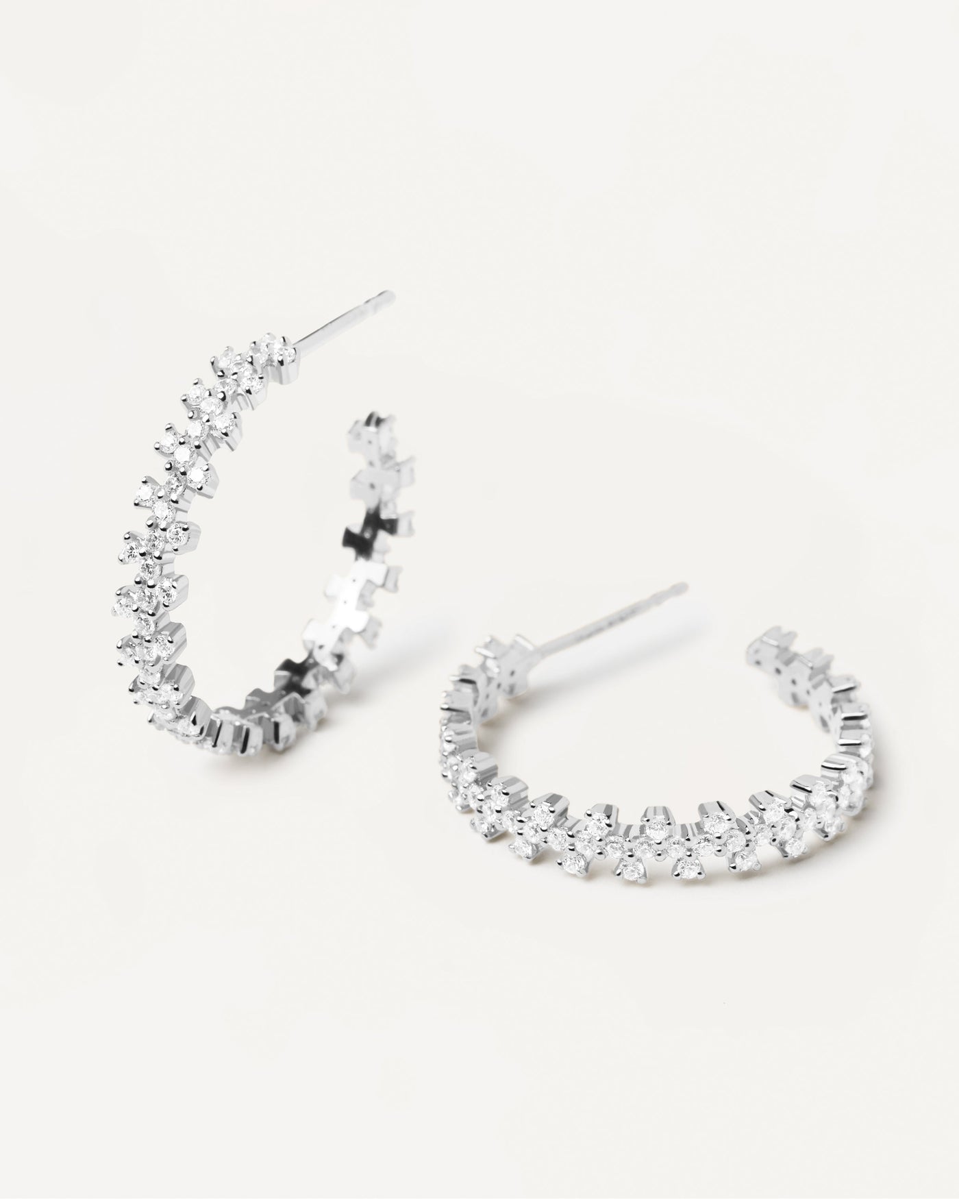 2023 Selection | Crown Silver Earrings. Silver hoop earrings with white zirconia. Get the latest arrival from PDPAOLA. Place your order safely and get this Best Seller. Free Shipping.
