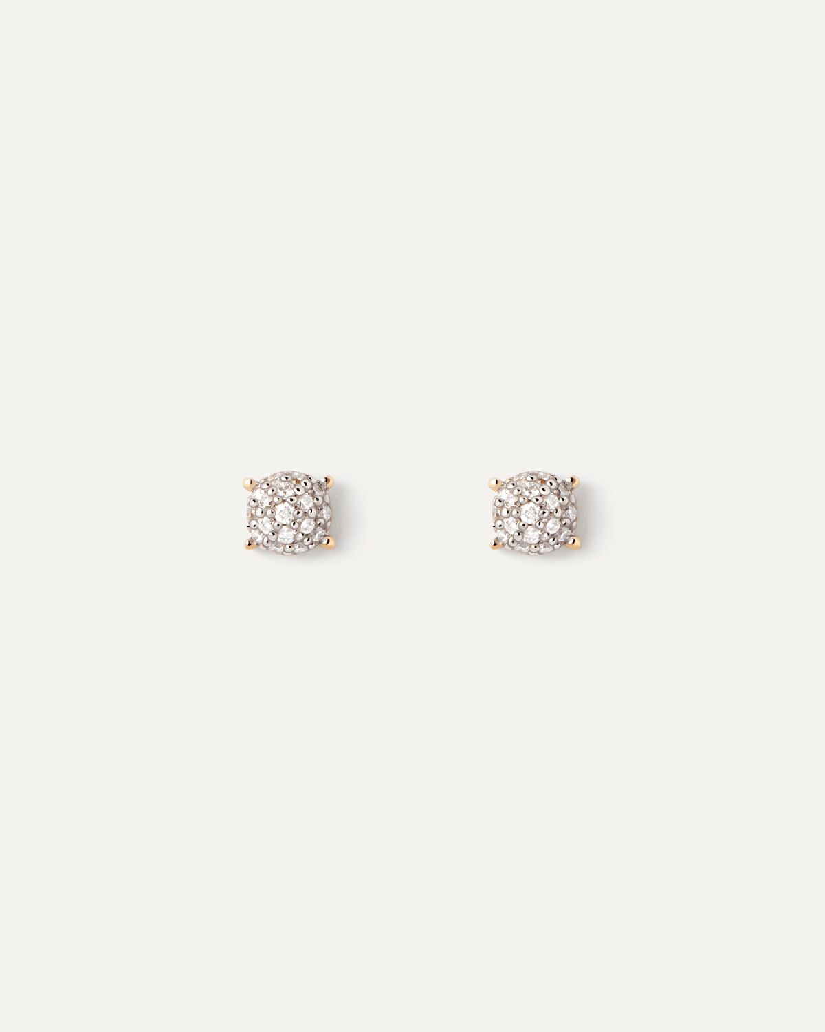 Diamonds and gold Dona stud earrings.  Minimalist round stud earrings in solid yellow gold set with a pavé lab-grown diamond  . Get the latest arrival from PDPAOLA. Place your order safely and get this Best Seller.
