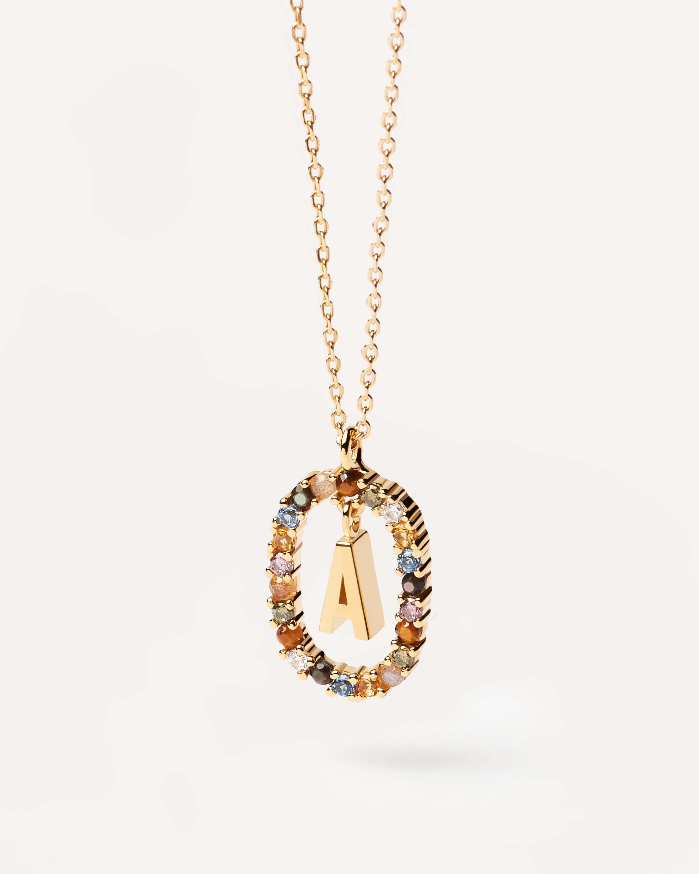 Initial A necklace in gold plated silver circled by colorful gemst. Letter A Necklace PDPAOLA