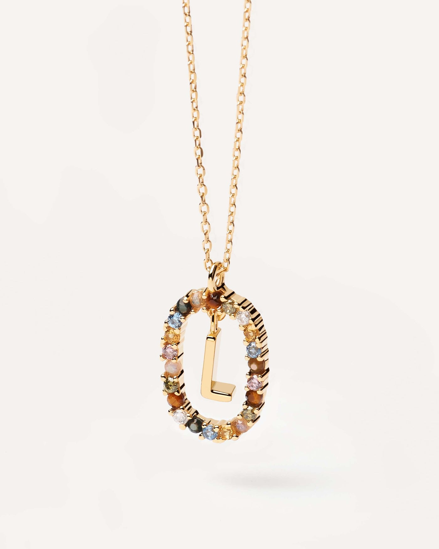 2023 Selection | Letter L necklace. Initial L necklace in gold-plated silver, circled by colorful gemstones. Get the latest arrival from PDPAOLA. Place your order safely and get this Best Seller. Free Shipping.