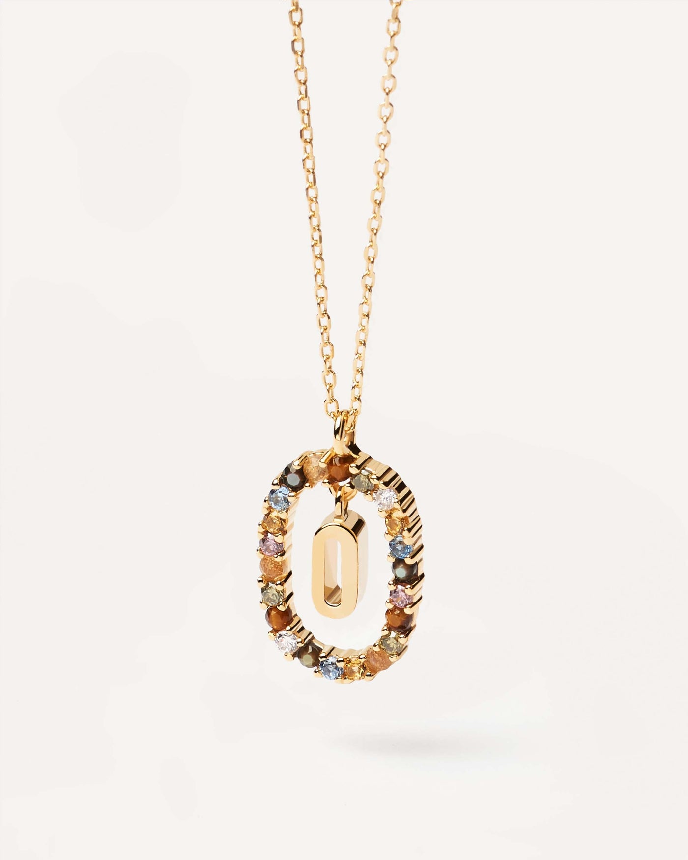 2023 Selection | Letter O necklace. Initial O necklace in gold-plated silver, circled by colorful gemstones. Get the latest arrival from PDPAOLA. Place your order safely and get this Best Seller. Free Shipping.