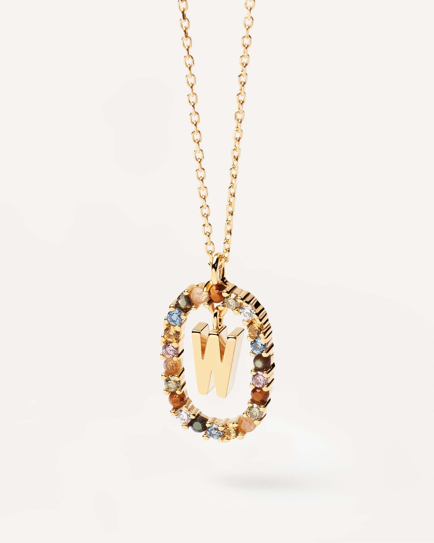 2023 Selection | Letter W necklace. Initial W necklace in gold-plated silver, circled by colorful gemstones. Get the latest arrival from PDPAOLA. Place your order safely and get this Best Seller. Free Shipping.